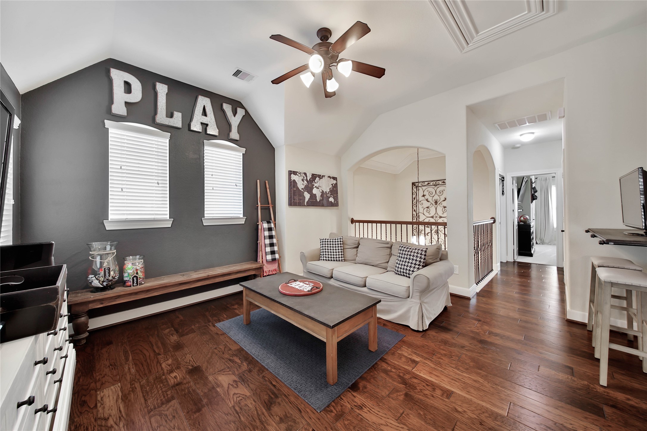 The game room features a built-in bar/computer desk/dedicated gaming space, creating the ultimate hangout area for work, play, and entertainment.