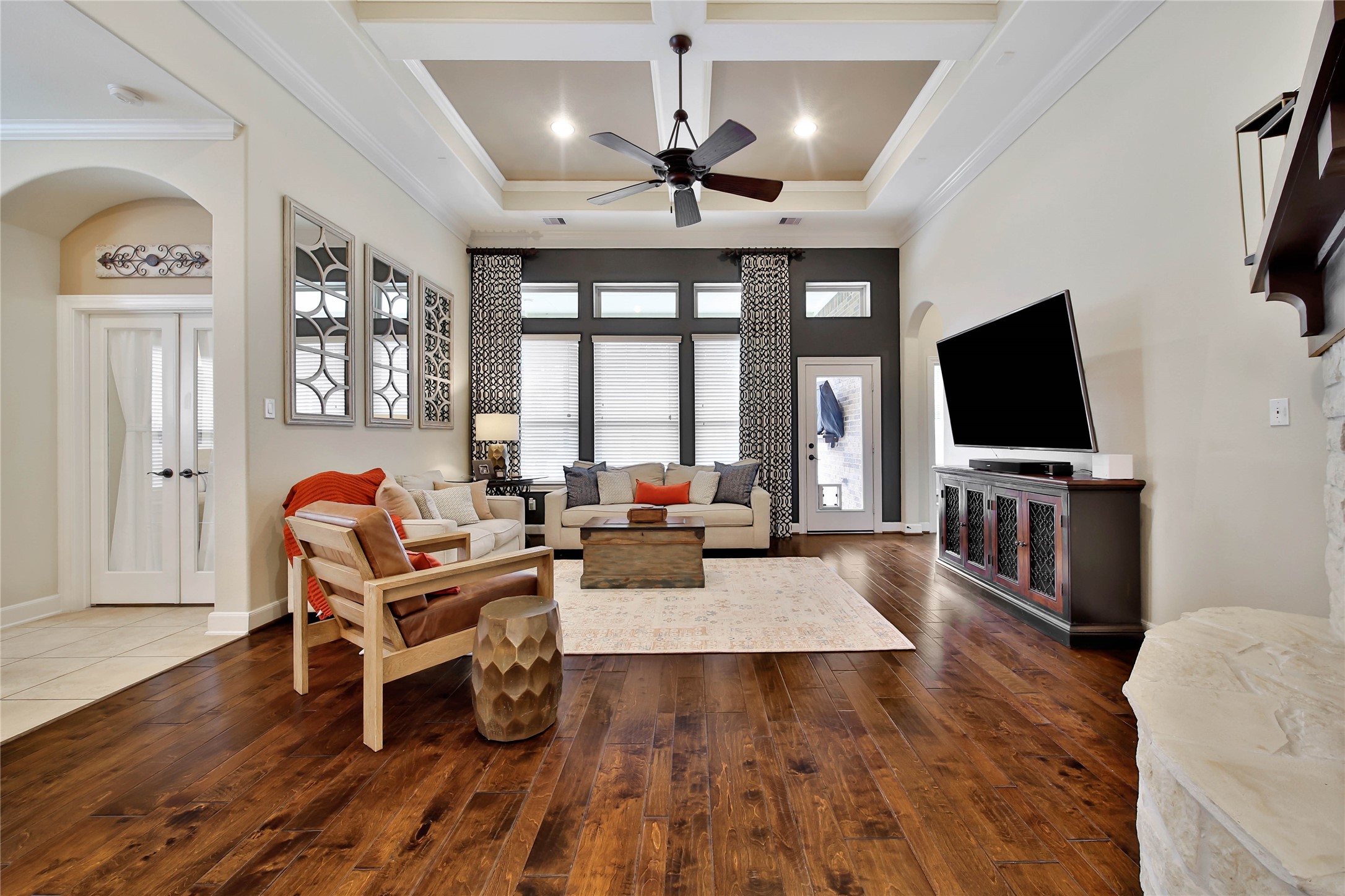 Make lasting memories in the cozy living room, where comfort and warmth create the perfect gathering space for family and friends