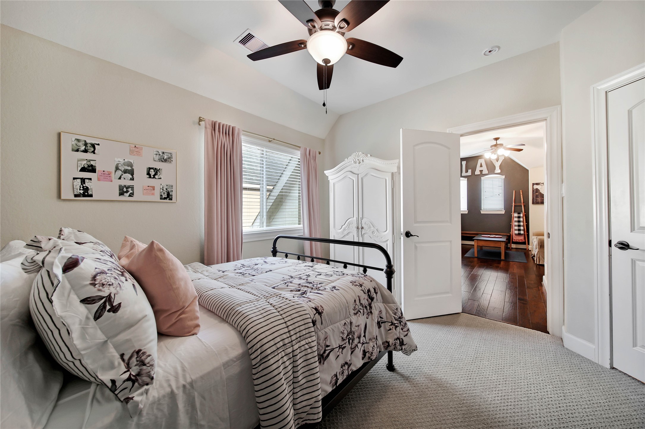 This upstairs bedroom has a private bathroom.