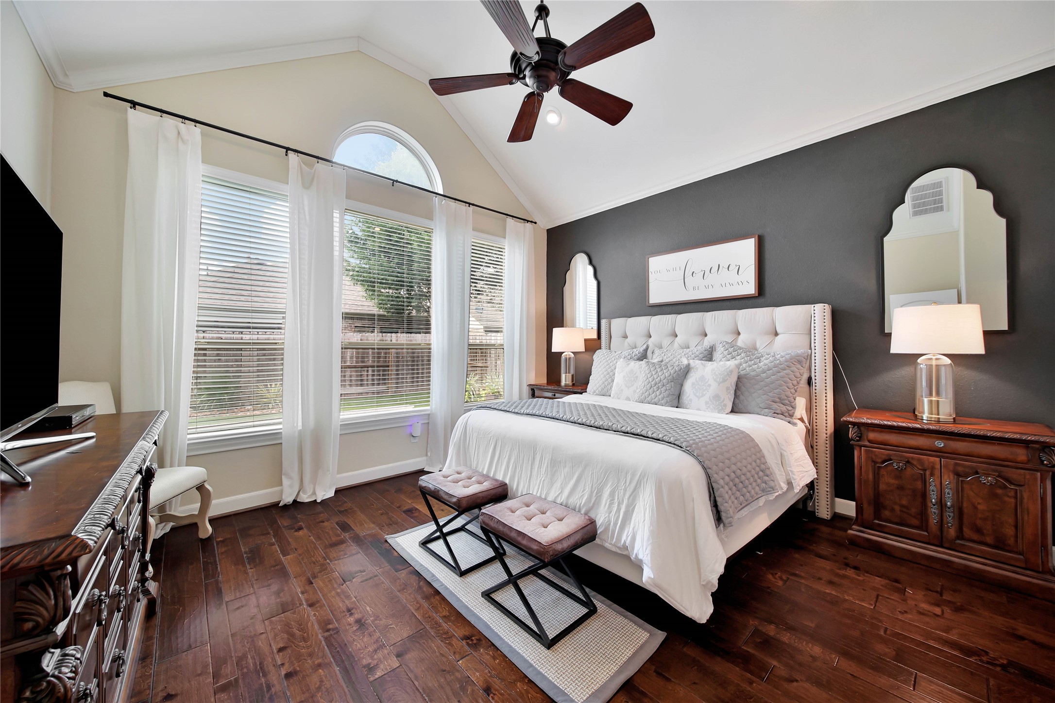 The primary suite is a wonderful escape for two, offering a peaceful retreat to relax, unwind, and recharge.
