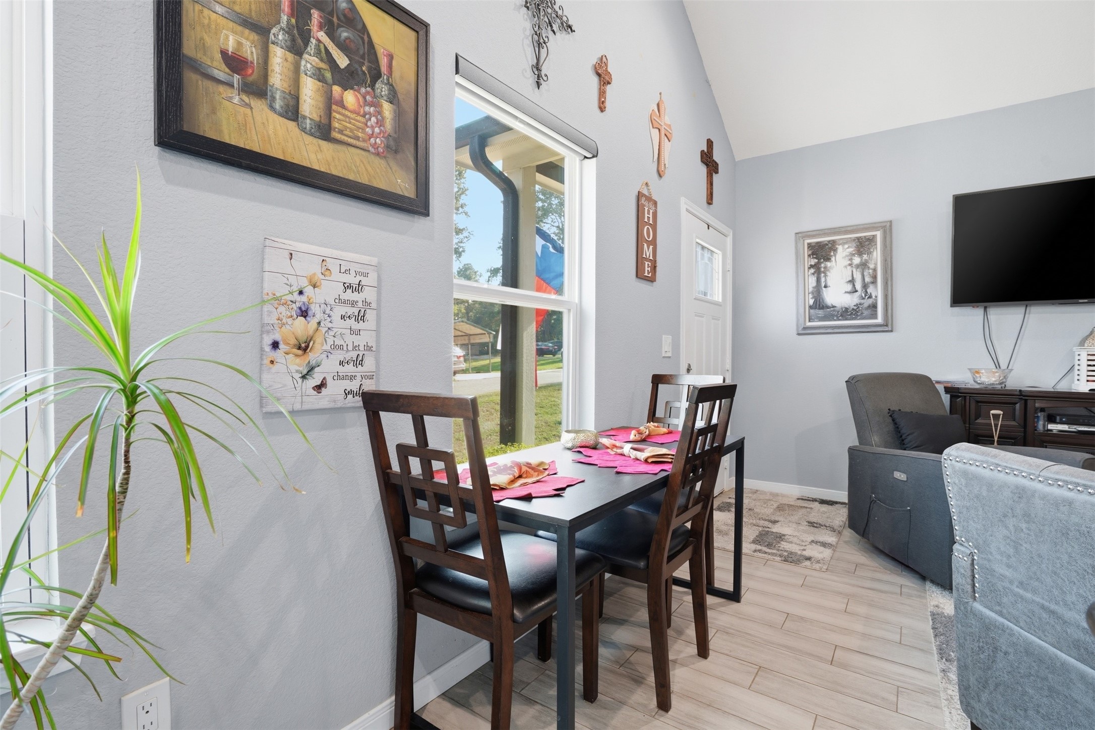 Dining area with natural light, modern decor, and an inviting atmosphere, perfect for intimate meals and gatherings.