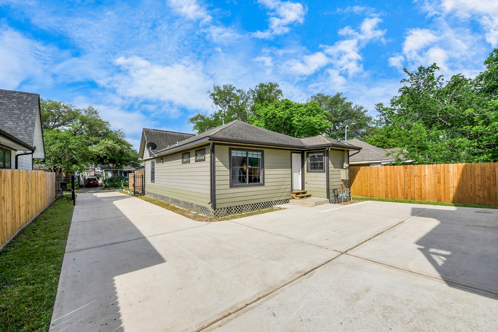 street parking in the front and additional parking behind the main home