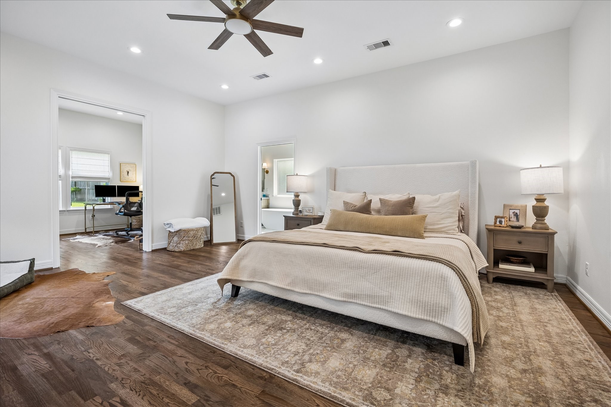 Renovated Primary Bedroom has 10' ceilings