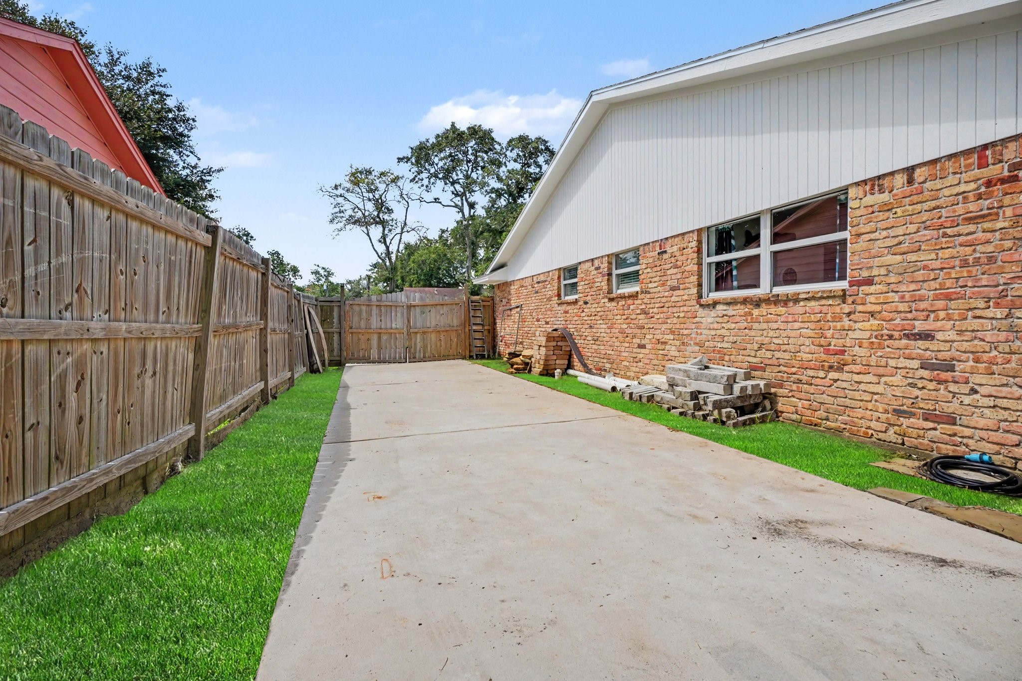 Second Driveway equipped with 30amp plug and rv cleanout