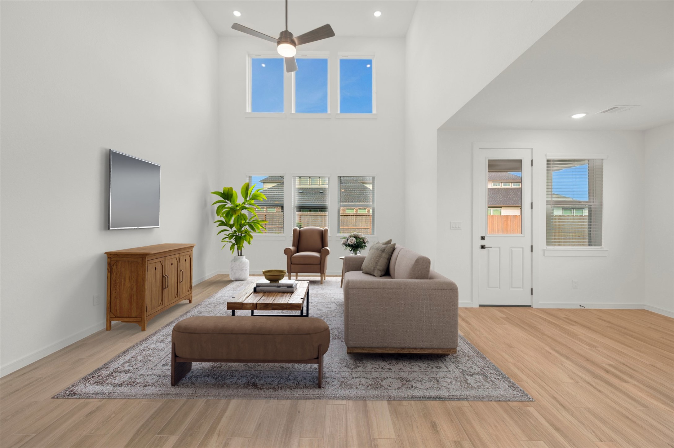 Impressive great room with high ceilings (*Photo not of actual home and used for illustration purposes only.)