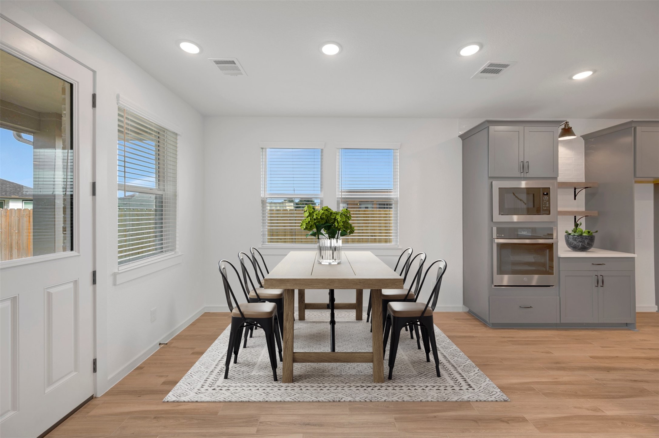 Sun-lit dining area (*Photo not of actual home and used for illustration purposes only.)