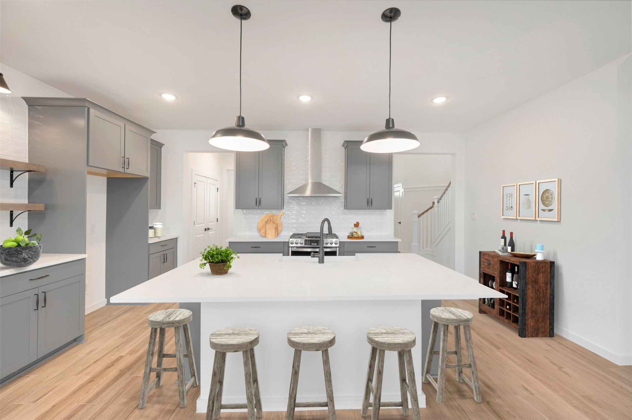 Gourmet island kitchen (*Photo not of actual home and used for illustration purposes only. Colors/finishes may differ from the ones currently selected in the home.)