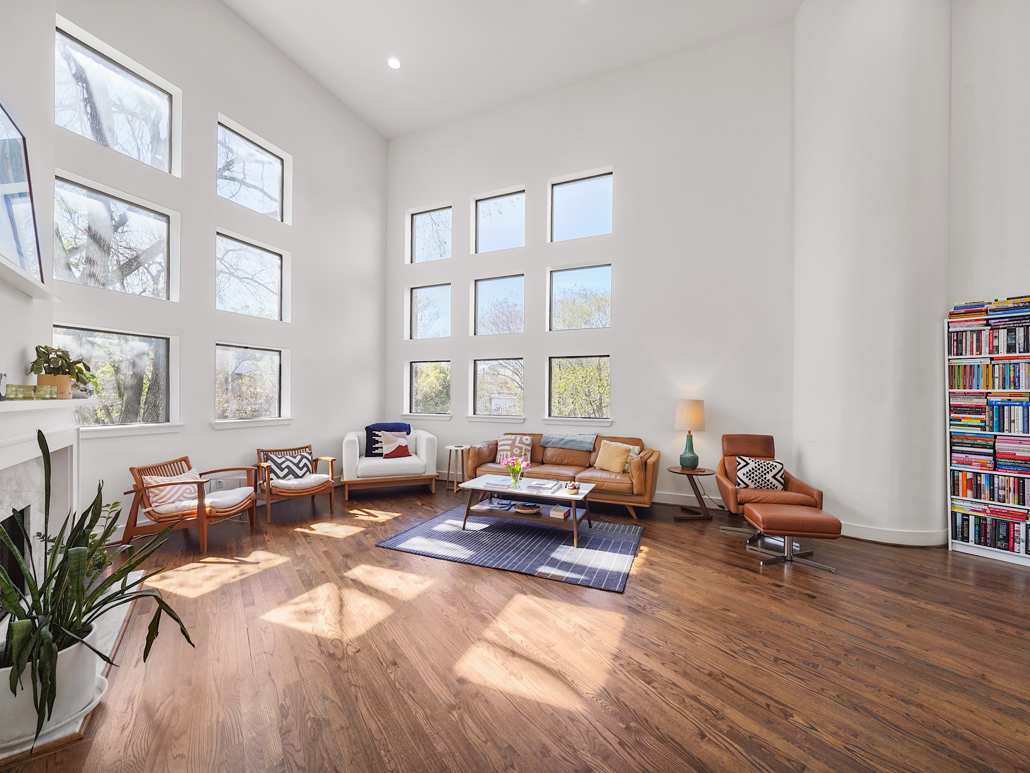 Experience the breathtaking living area with floor-to-ceiling windows that bathe the space in natural light. Experience the breathtaking living area with floor-to-ceiling windows that bathe the space in natural light.