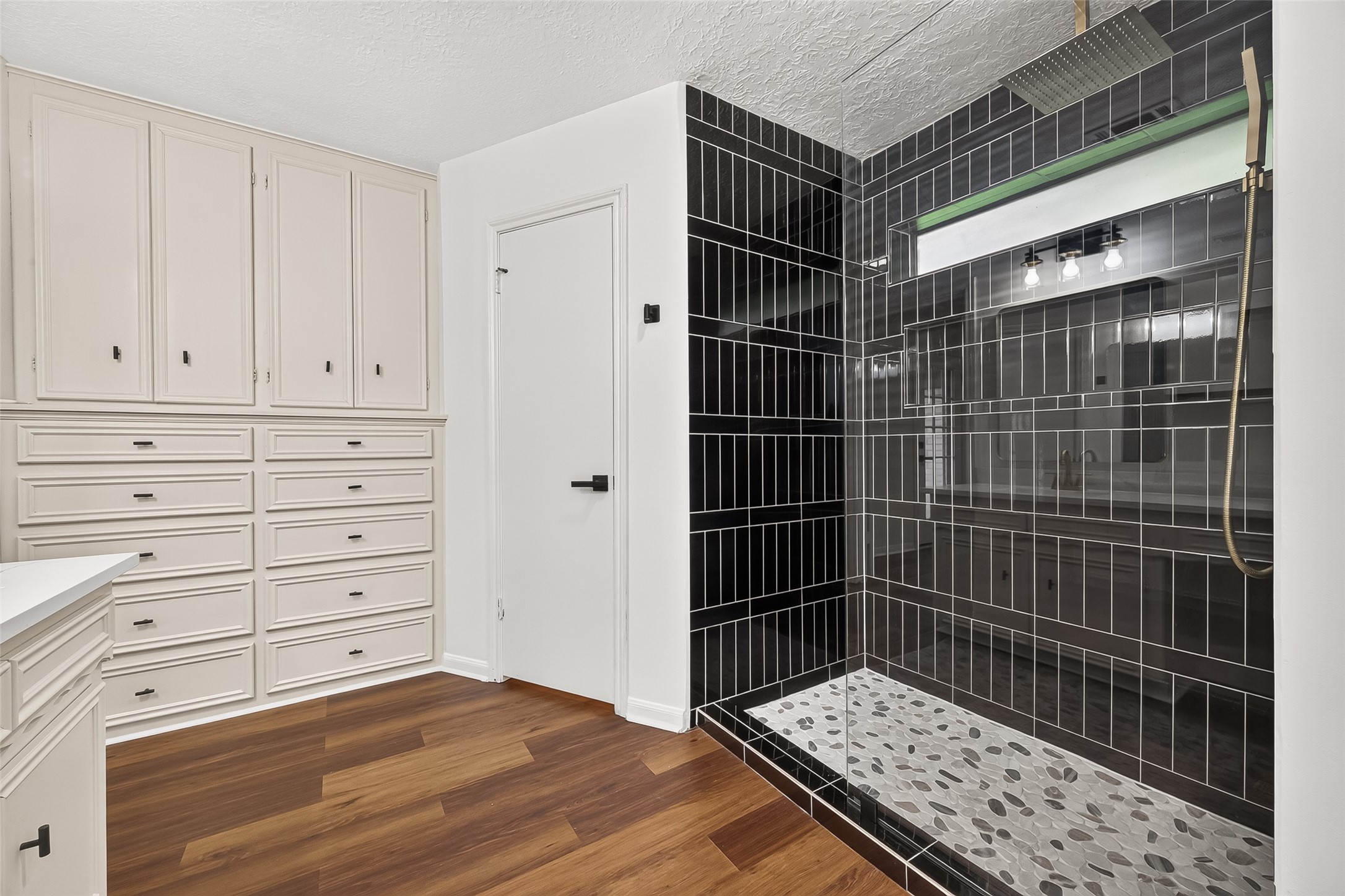 Modern primary bathroom offering a
luxurious rainfall shower head