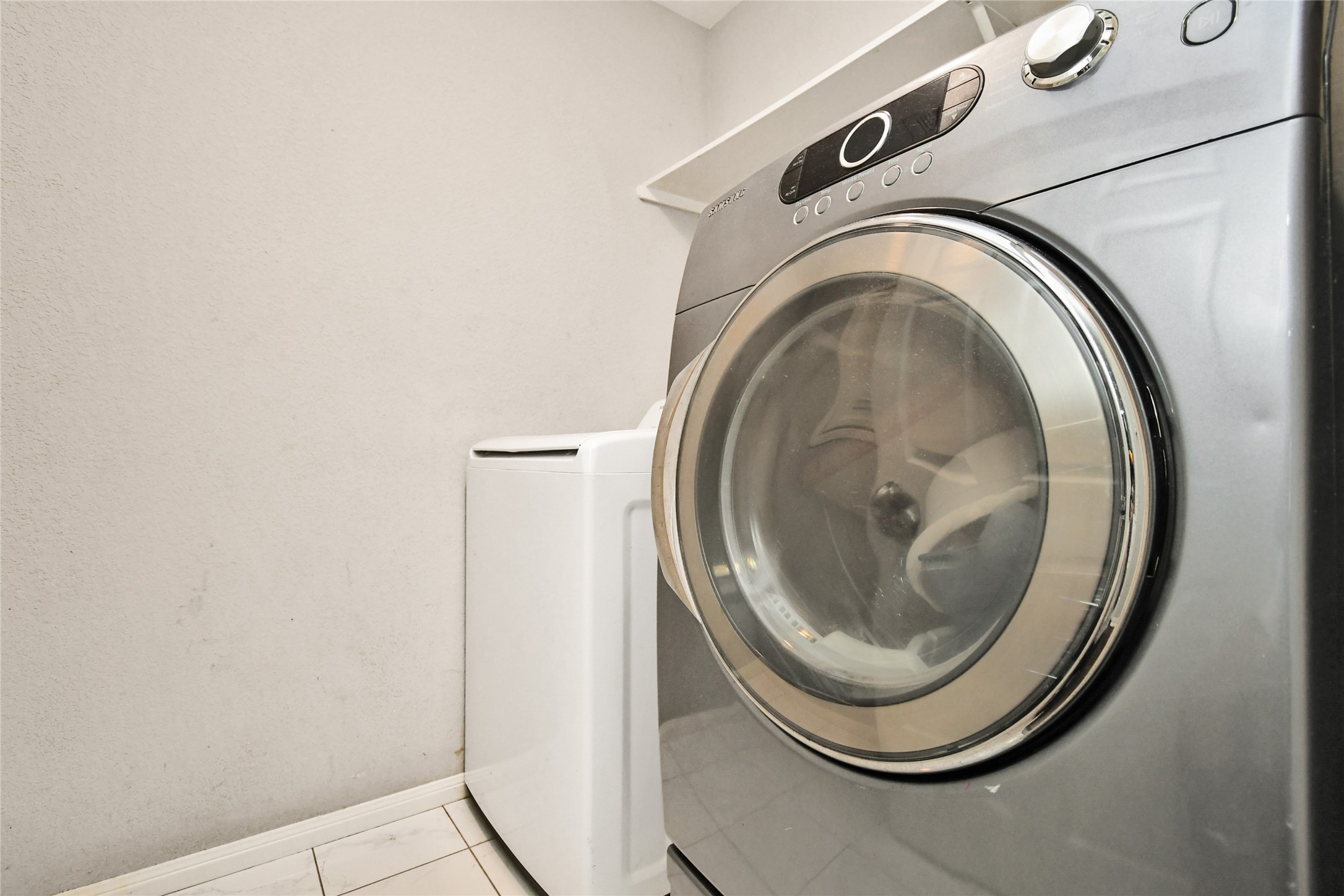 Convenient laundry area with washer and dryer hookups included.
