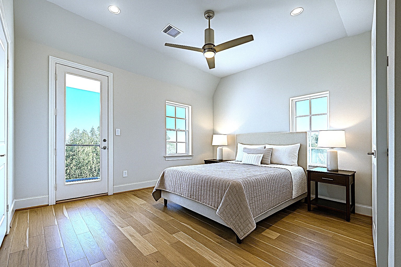 Virtually staged primary bedroom.  Note the door to the terrace!