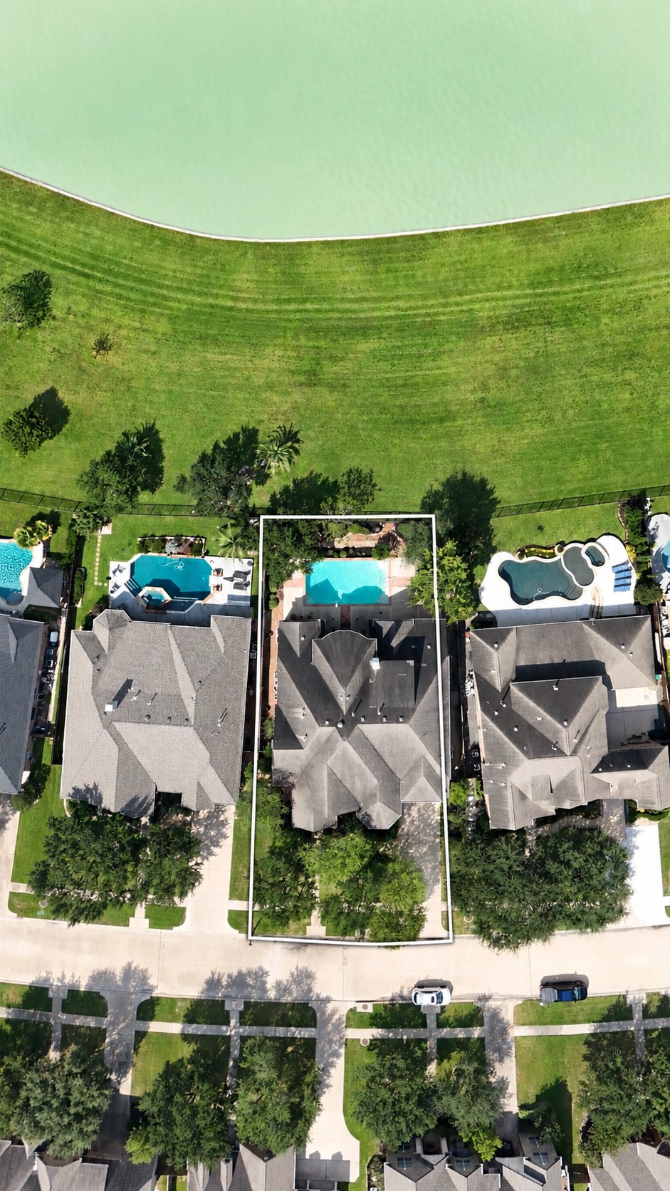 Overhead view of the great lot, pool, and lake view.