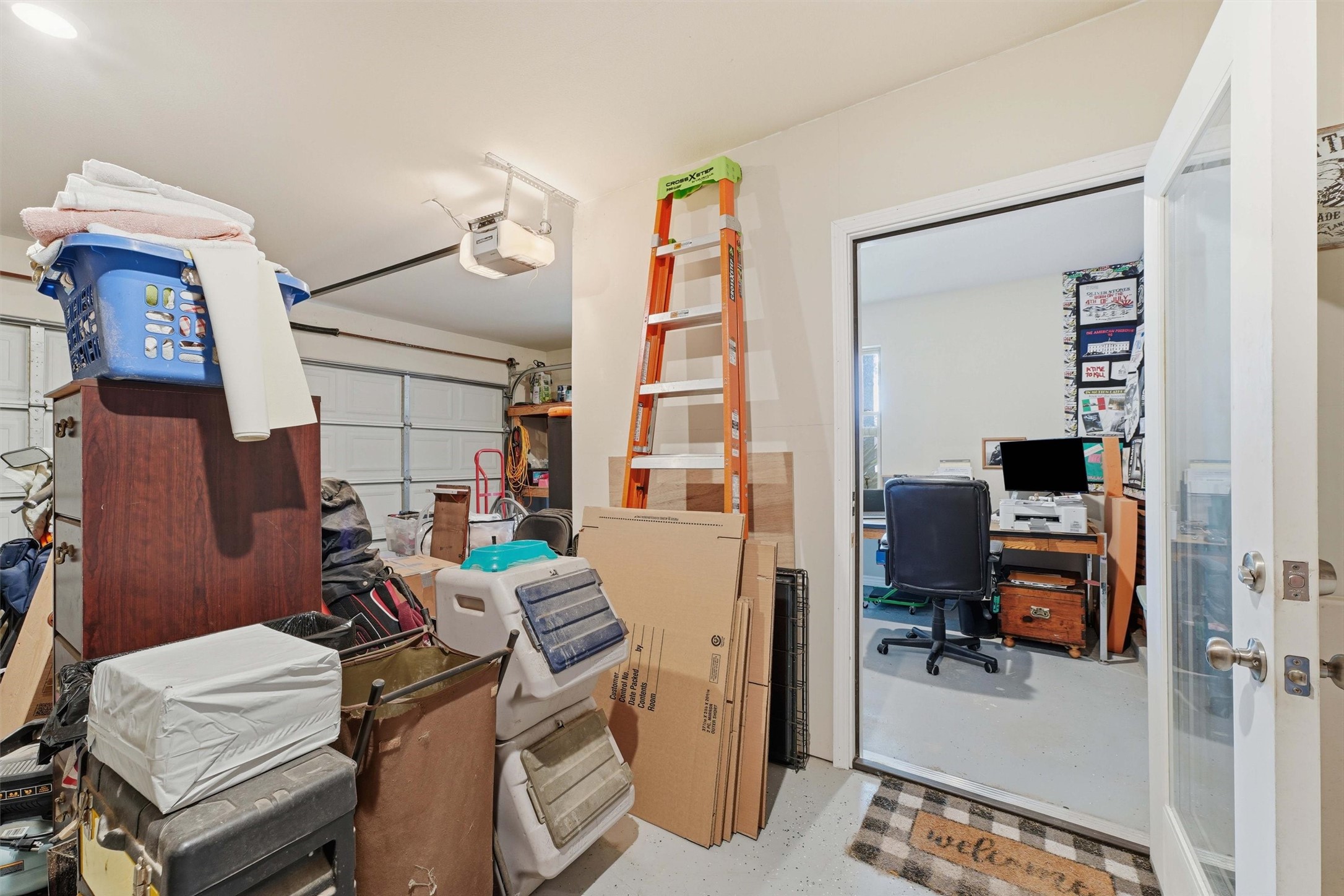 a home office was built in one section of the garage that has a cooling unit.  This conversion can be converted back to the full 2 car garage if needed.
