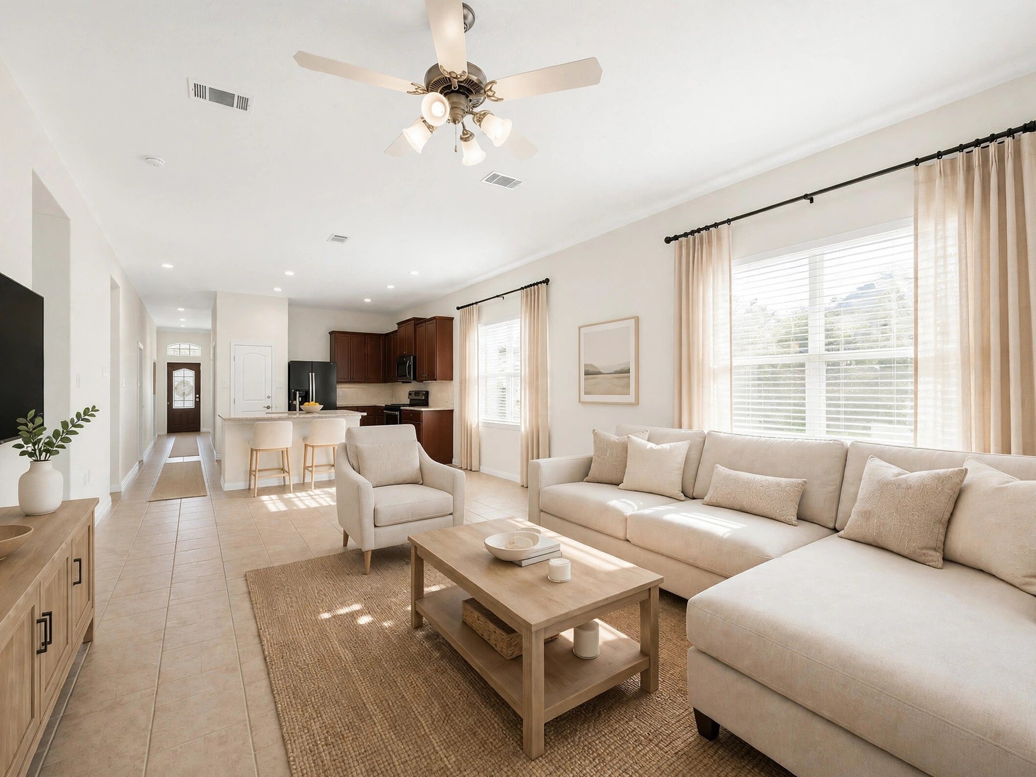 This furnished view illustrates the living areas potential, with an open layout connecting to the kitchen. (Virtually staged) This furnished view illustrates the living areas potential, with an open layout connecting to the kitchen. (Virtually staged)