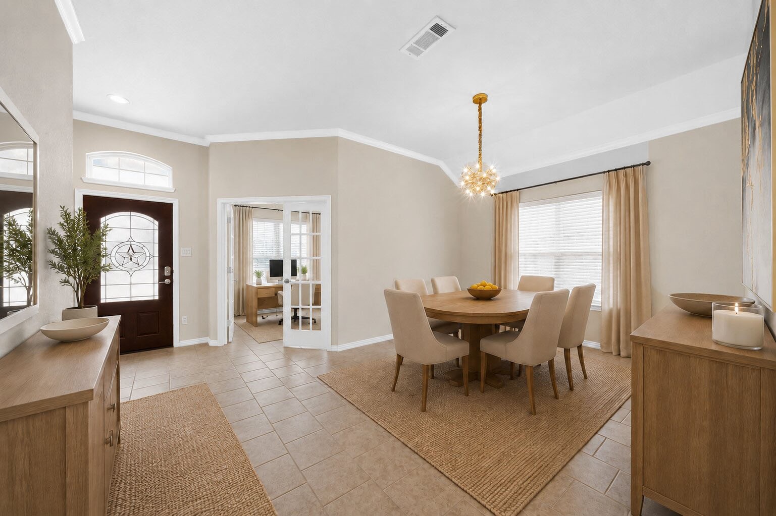 Virtually staged to illustrate the dining rooms layout and furnishing possibilities. Features include tile flooring, crown molding, a decorative chandelier, and a large window. French doors lead to an adjacent room. Virtually staged to illustrate the dining rooms layout and furnishing possibilities. Features include tile flooring, crown molding, a decorative chandelier, and a large window. French doors lead to an adjacent room.
