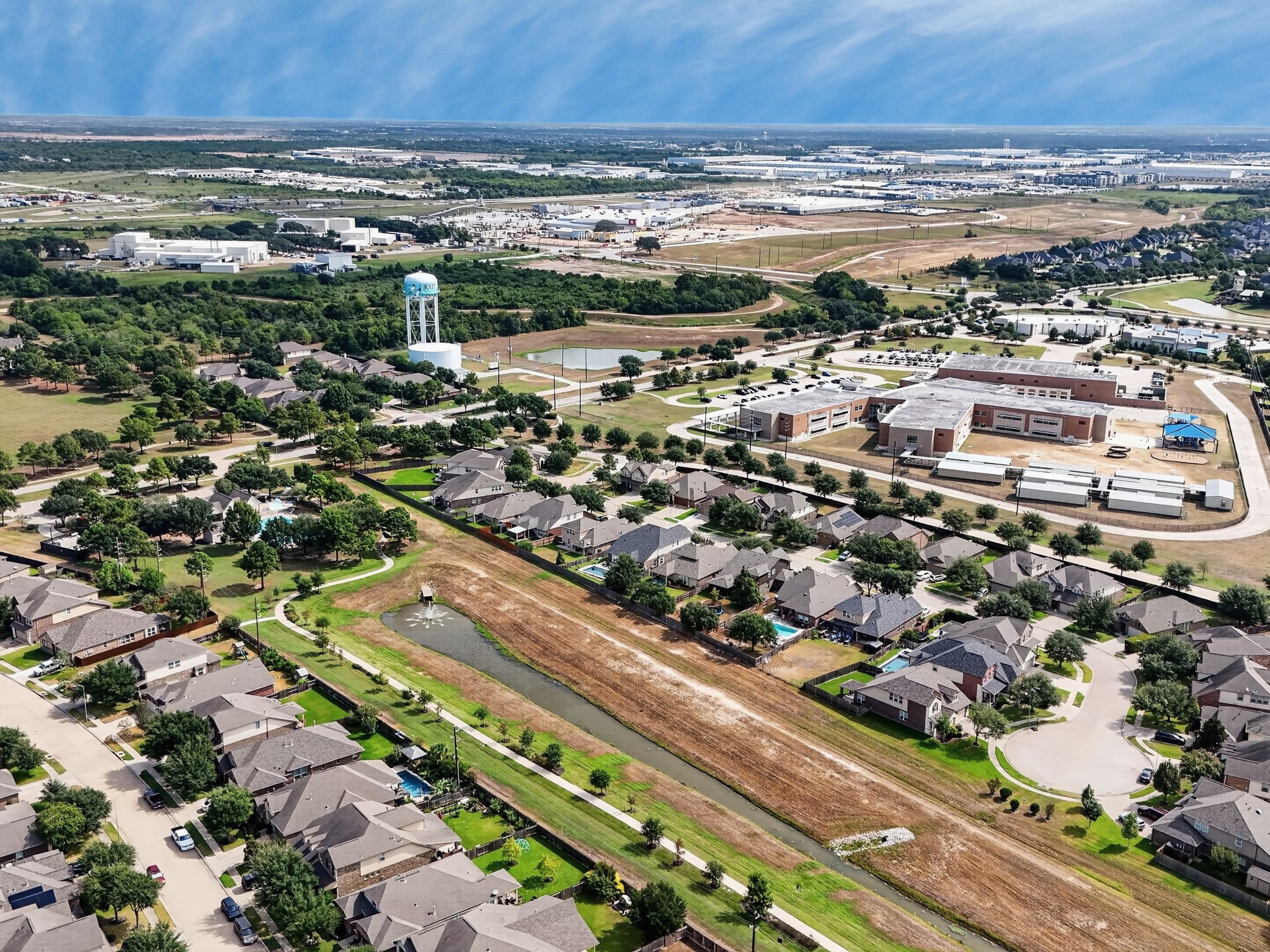 Aerial perspective provides a broader view of the surrounding neighborhood and nearby development.