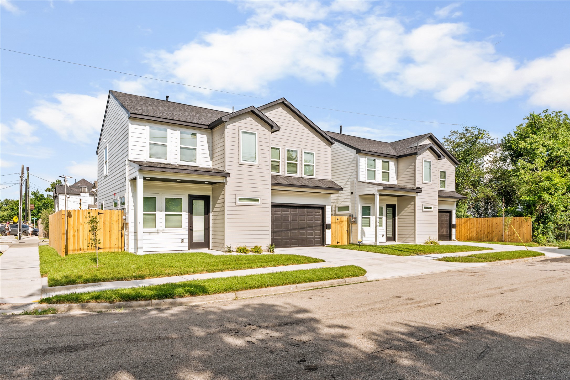 Sleek design from every angle  a look at the impressive footprint, deep driveway, and secure fencing that balances stylish architecture with everyday functionality.