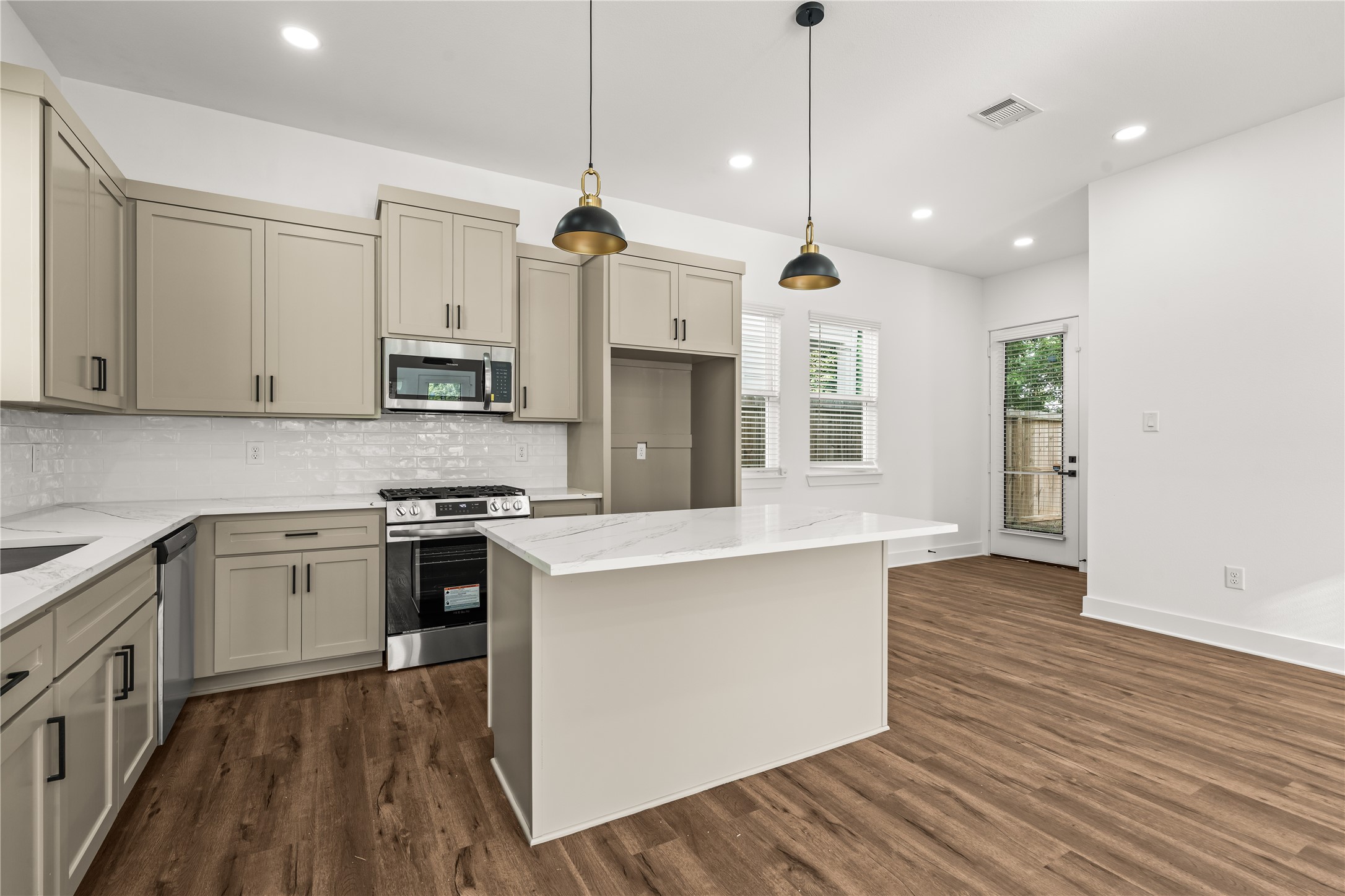 Open, intuitive, and highly functional. The strategic layout positions everything perfectly, leading right out to your private backyard oasis.