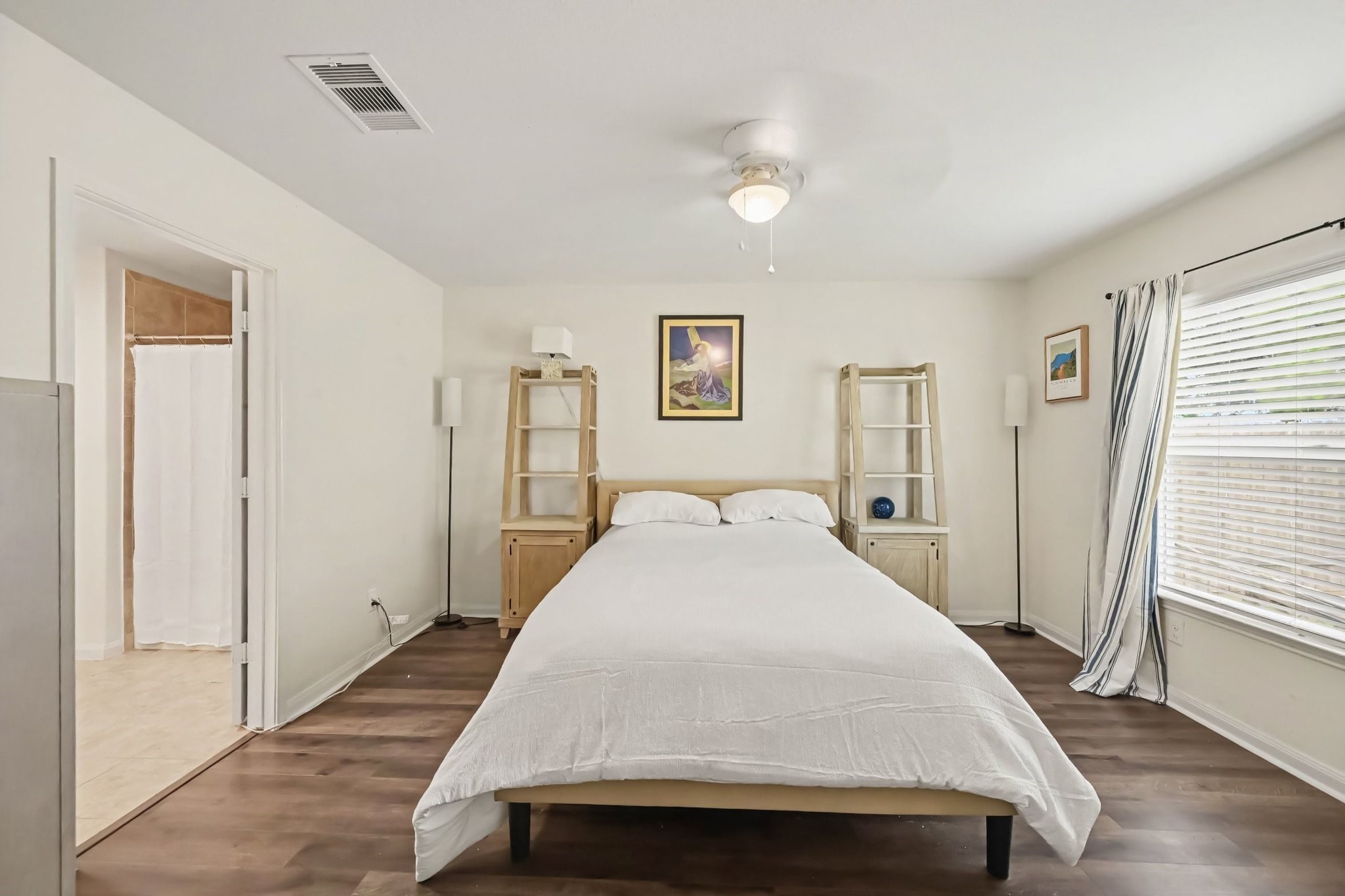 Spacious primary suite easily accommodates King-sized furniture