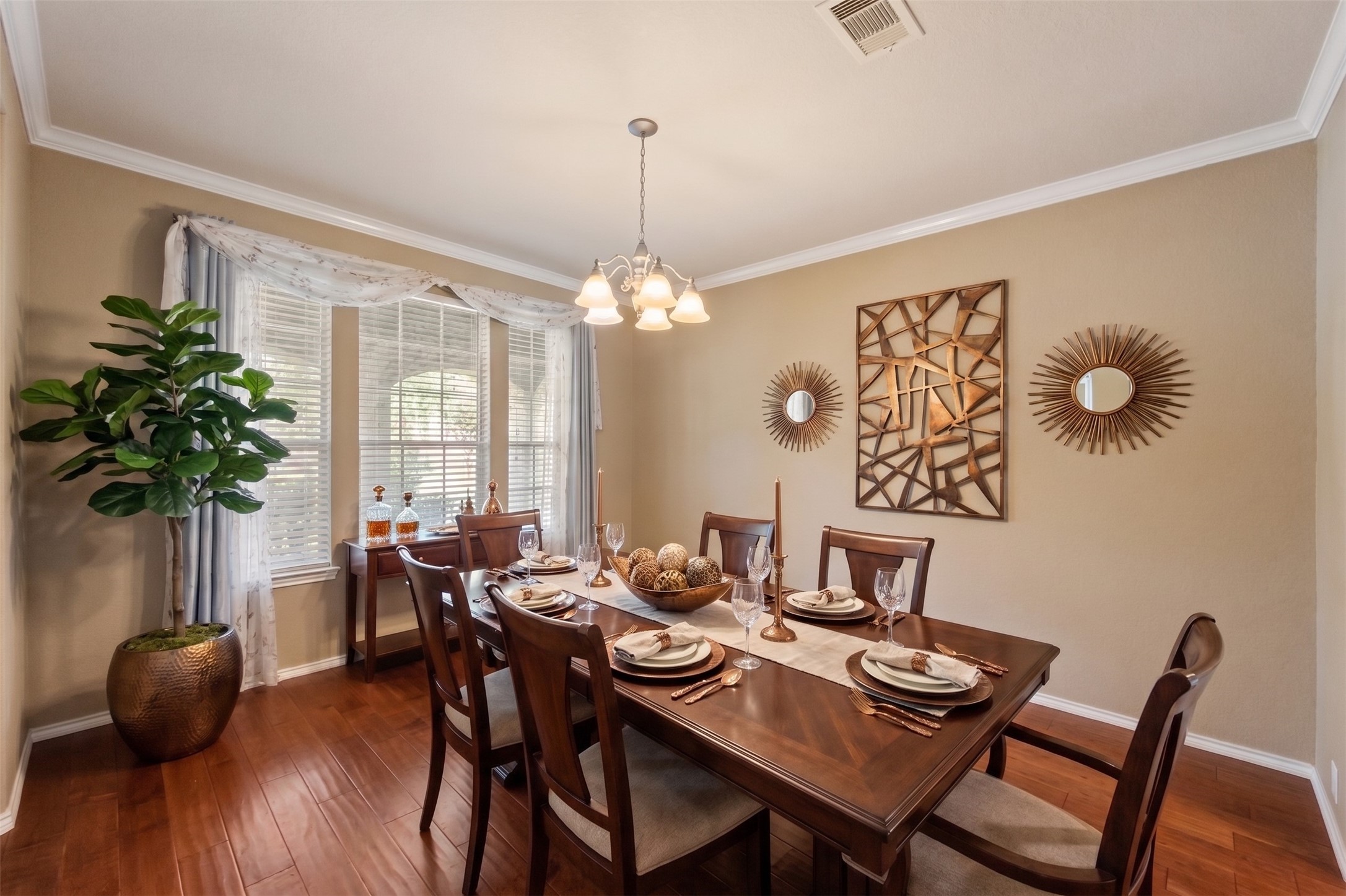 The formal dining room is spacious for all your entertaining needs.  Virtually staged photo