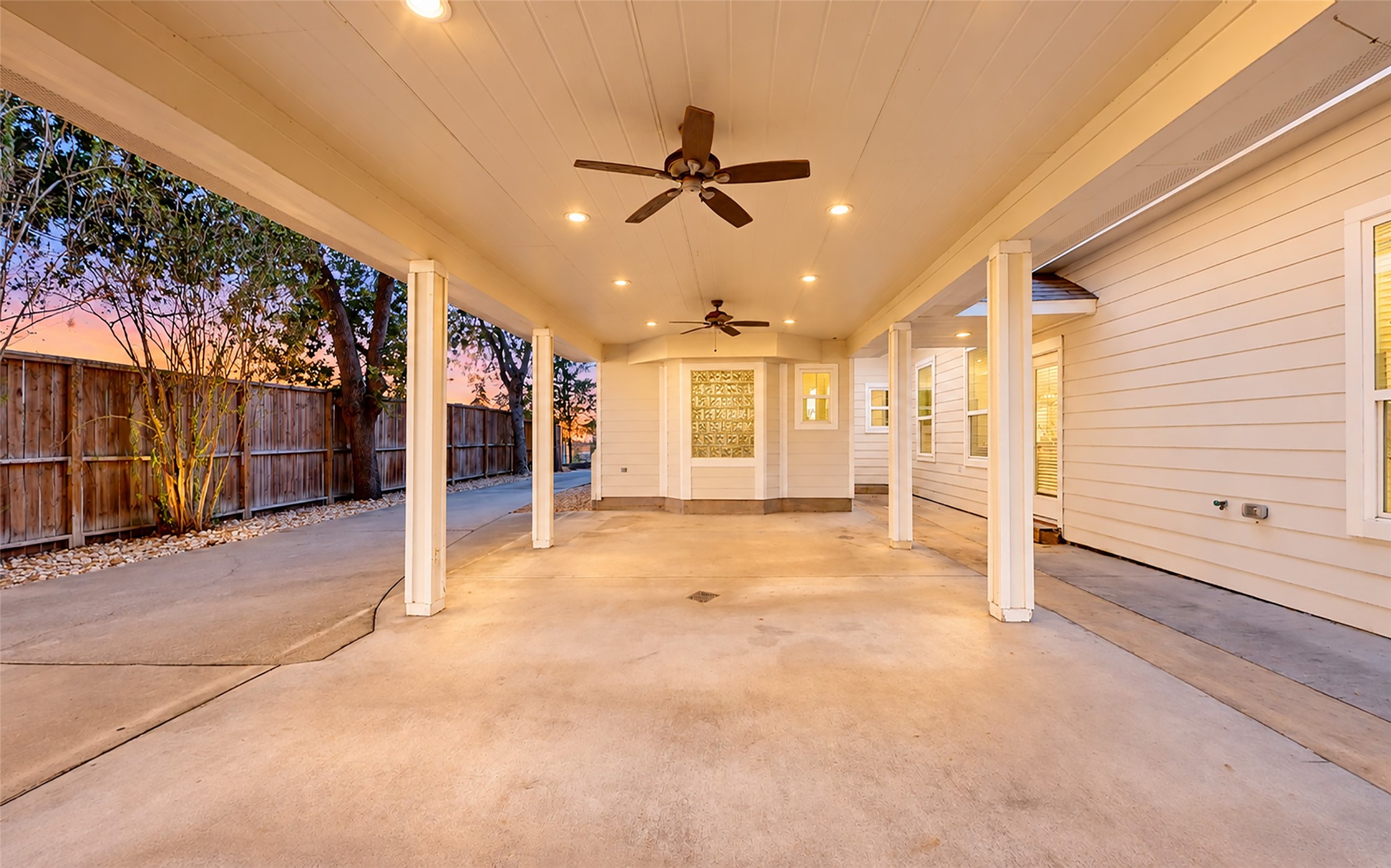 Rain or shine, this spacious covered area is ready for entertaining. With cooling ceiling fans, recessed lighting and plenty of room for outdoor dining, weekend cookouts or gathering with friends, it's a wonderful place to enjoy the outdoors year-round.
