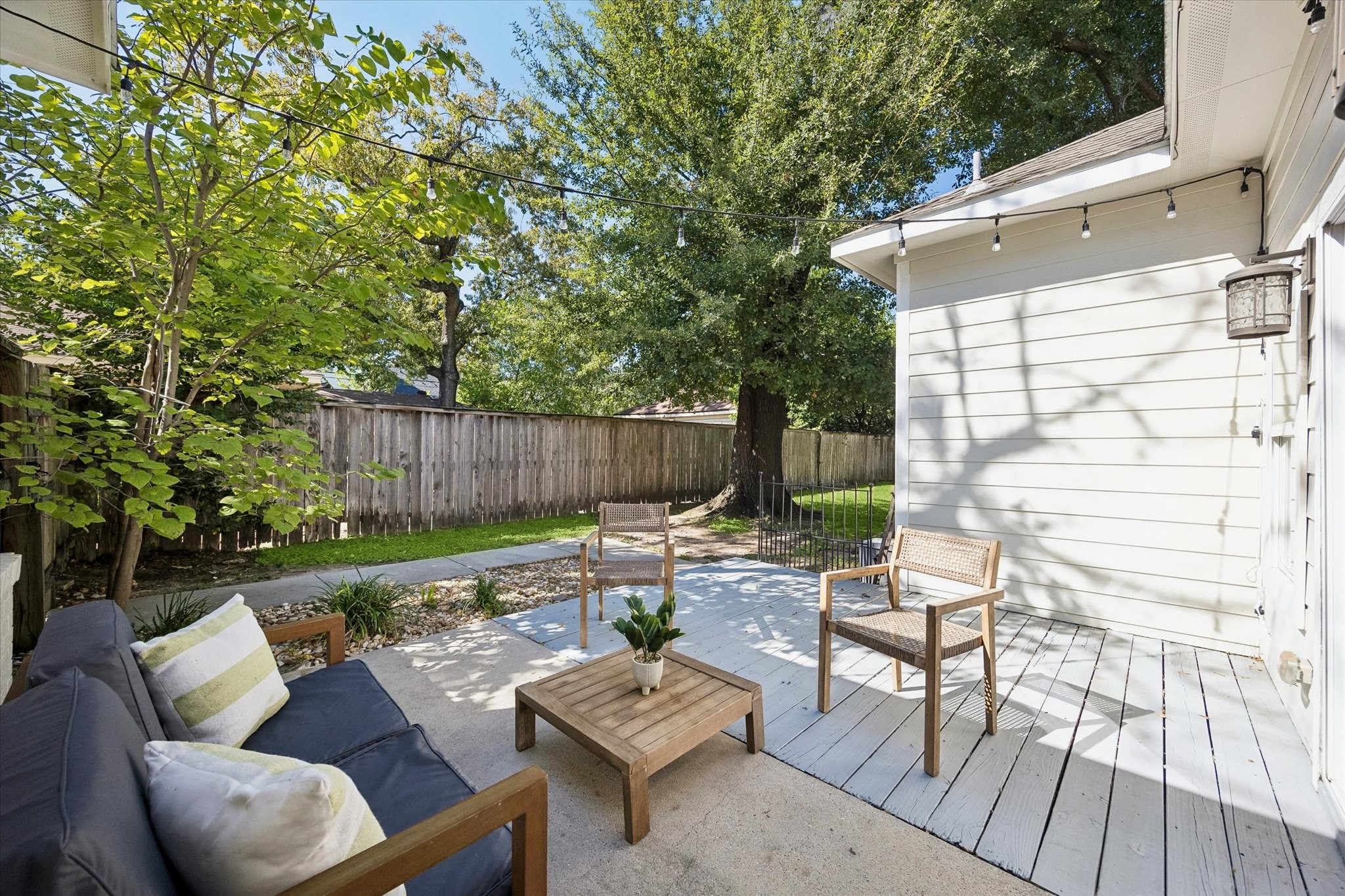 This charming private patio and recently refreshed deck offer a cozy spot to sip your morning coffee, catch with friends or simply enjoy a little fresh air. Mature trees, lush landscaping and a full sprinkler system add to the peaceful setting, making it easy to relax and unwind.