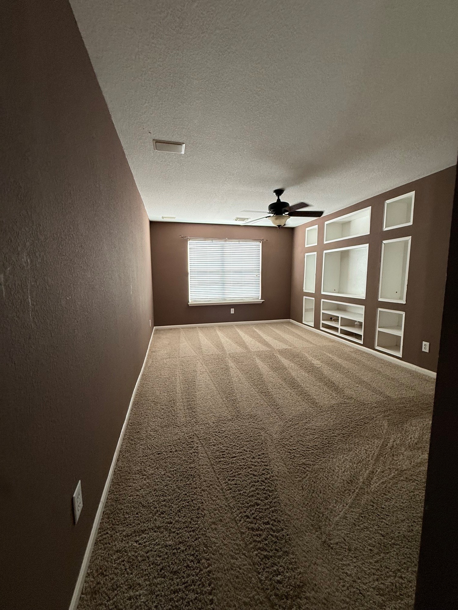 Spacious Gameroom with built-in cabinets. Spacious Gameroom with built-in cabinets.