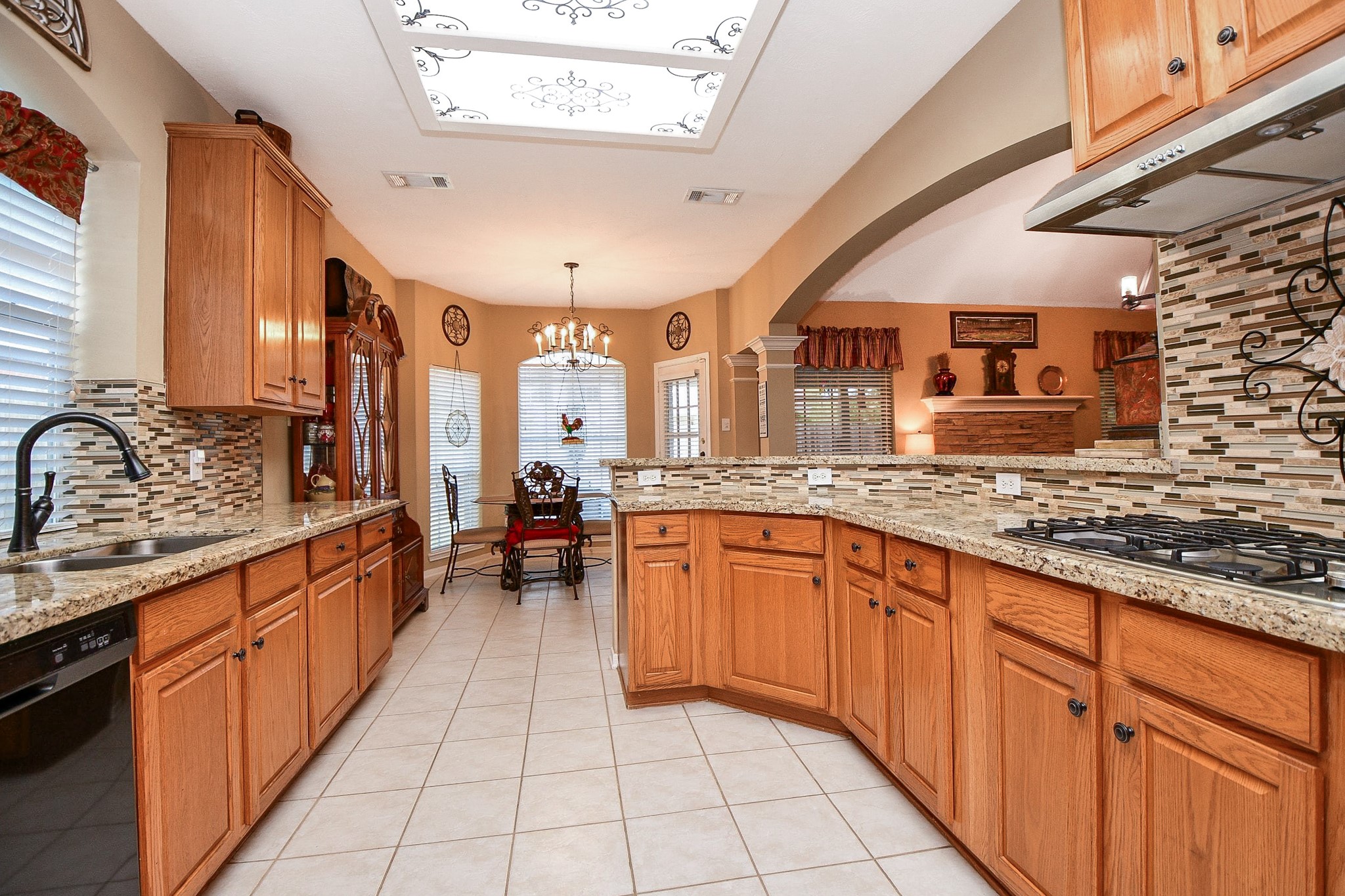 Whether you're preparing a favorite family recipe or trying something new, you'll appreciate the gas cooktop, generous counter space and thoughtfully designed storage. With the kitchen remodel already completed, you can spend more time enjoying the space!