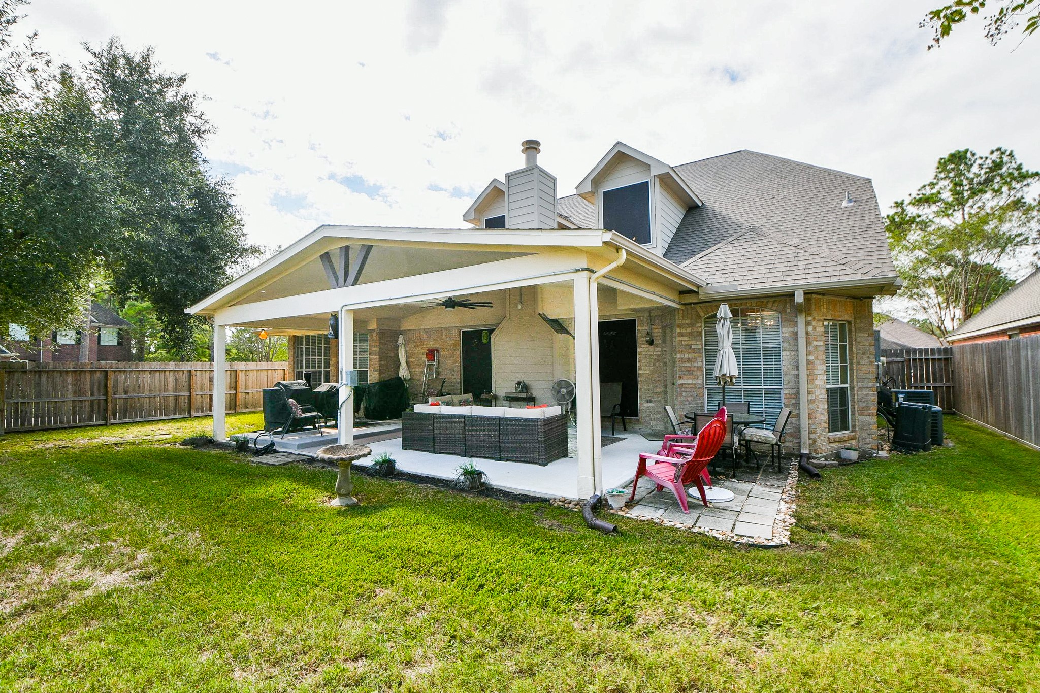 From summer cookouts to crisp fall evenings, this oversized covered patio creates an outdoor gathering place you'll enjoy throughout the year. Add your favorite outdoor furnishings and make this space entirely your own.