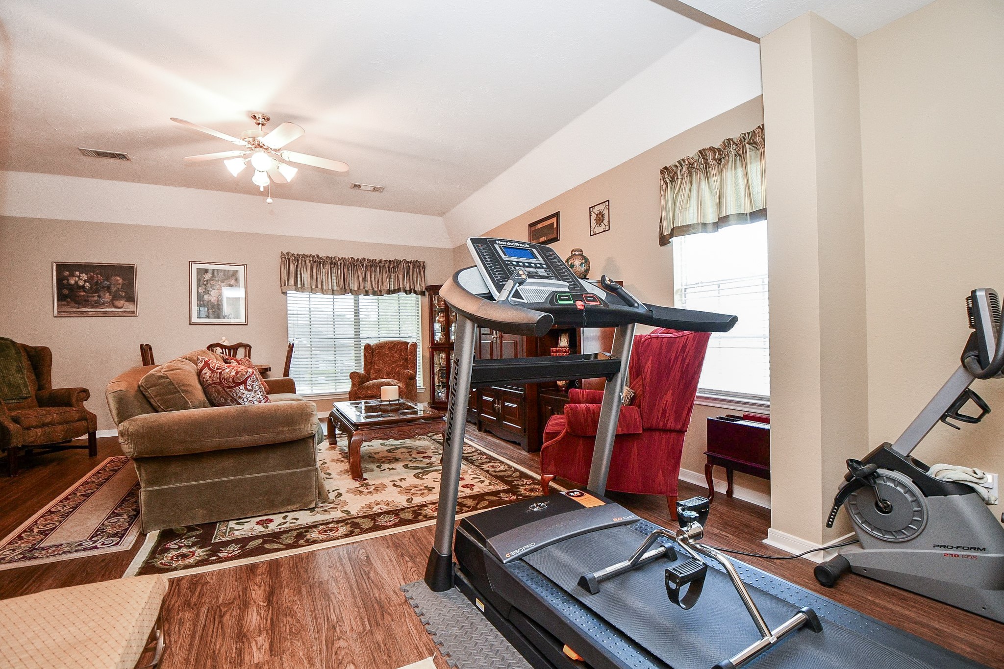 Why leave home for your workout when you have room to create your own fitness space? This expansive upstairs game room offers the flexibility to combine exercise, entertainment and relaxation in one versatile area.
