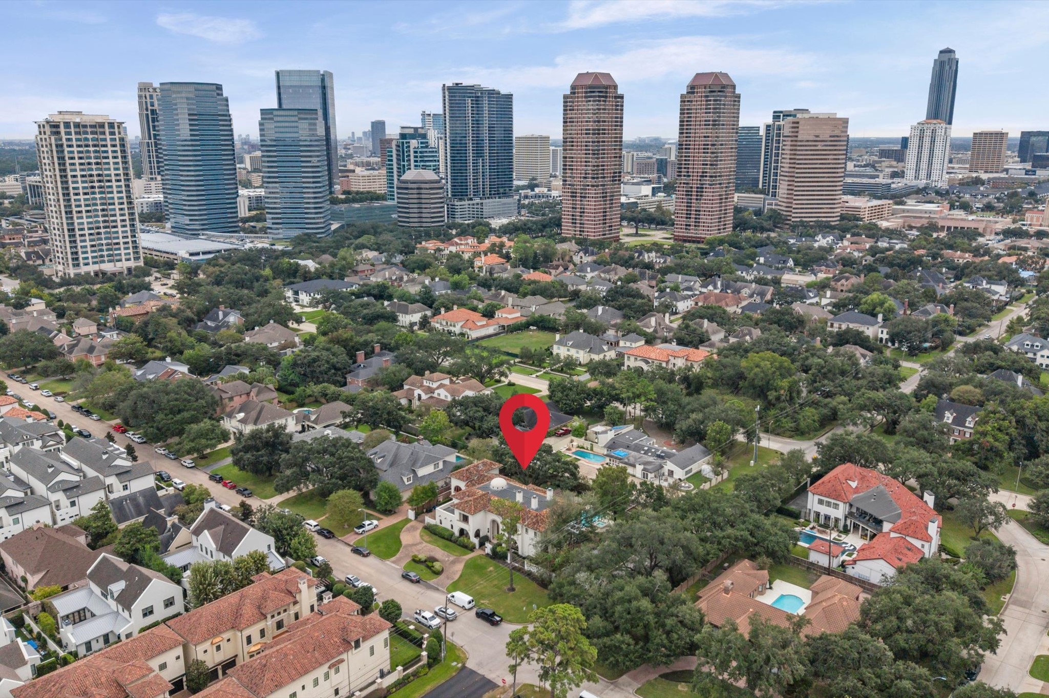 Ideally situated in the highly sought-after Tanglewood neighborhood, this exceptional estate offers a rare blend of privacy, prestige, and convenience, just moments from Houston's premier dining, upscale shopping, entertainment, and vibrant city attractions.