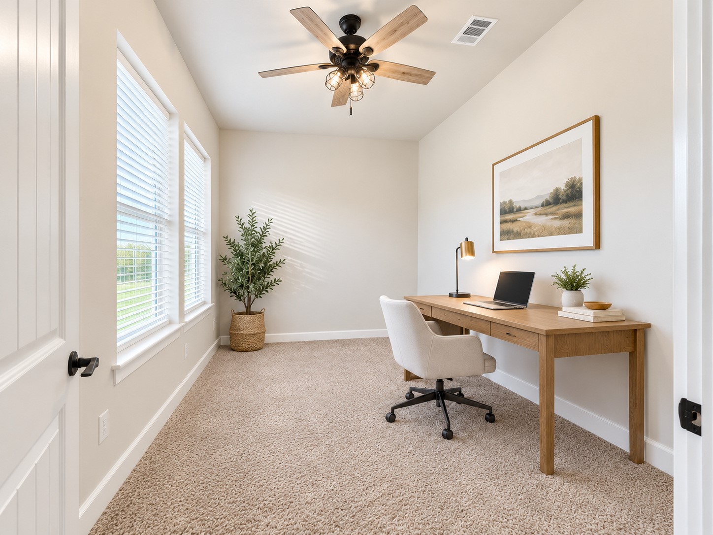 Versatile flex room with vaulted ceiling, abundant natural light, and ceiling fan offers endless possibilities! Shown virtually staged as a home office or study, this flexible space could also serve as a 4th bedroom, guest room, hobby room, or additional living area to suit your needs. Photo is virtually staged.