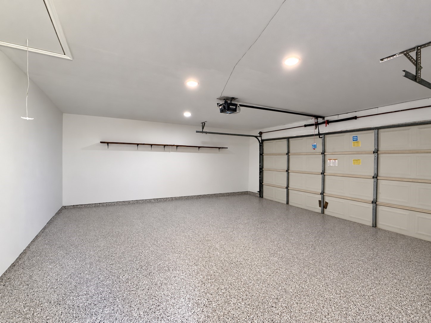 2 car garage with epoxy flooring