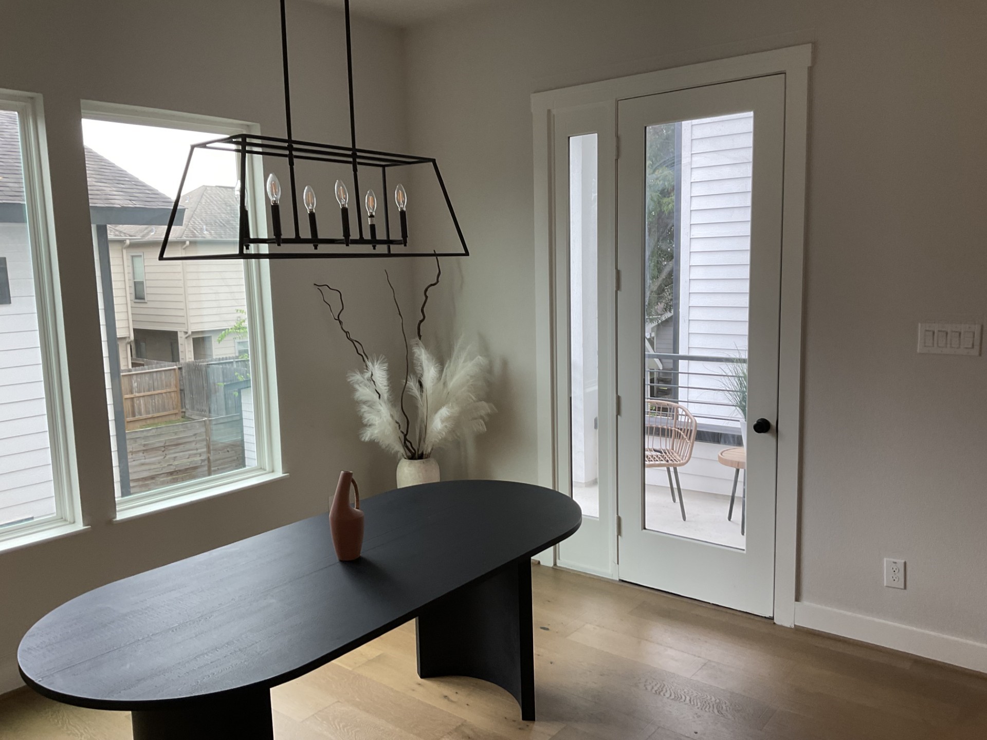 Breakfast area off the kitchen with the patio door behind it. Lots of light.