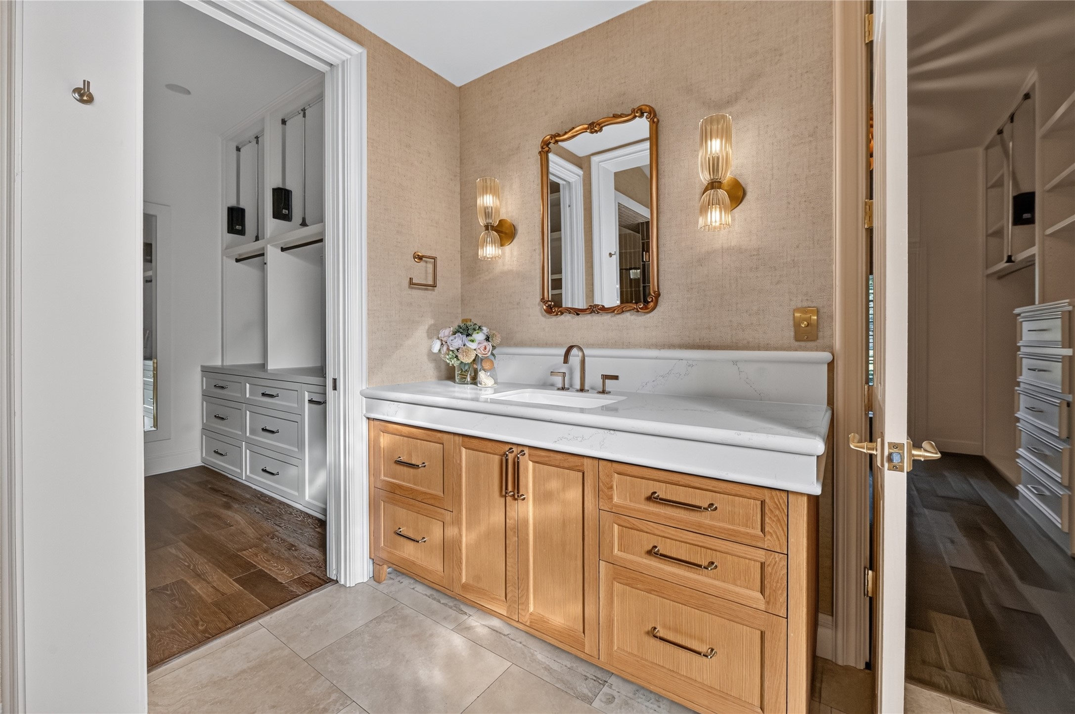 His and hers sinks and closets.