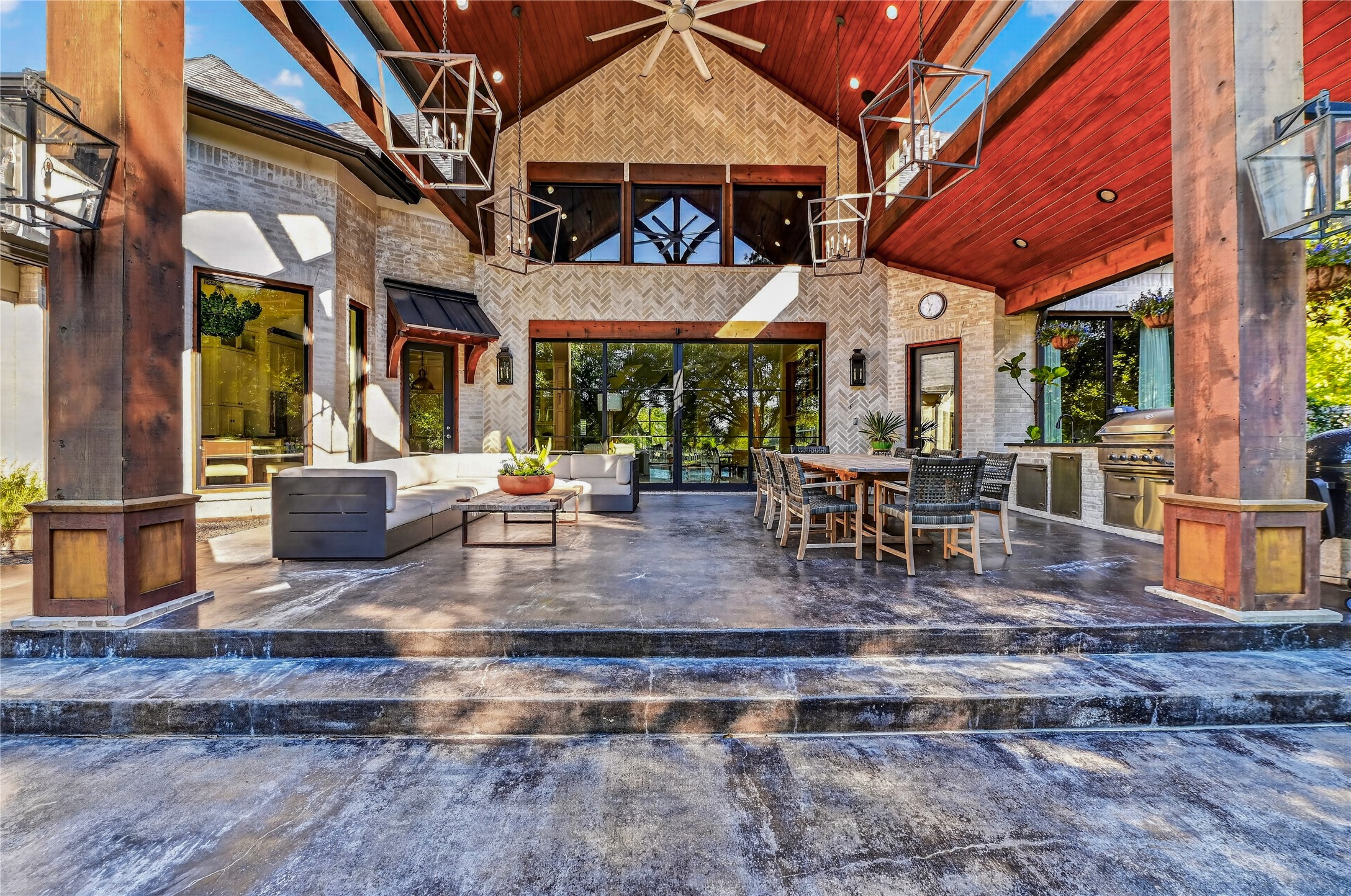 The ultimate Texas retreat - heavy cedar beams and a pitched roof frame the outdoor living and kitchen. Complete with amenities a host will greatly appreciate - a 1/2 bath, ice machine and extra fridge space are accessible via the newly remodeled garage.