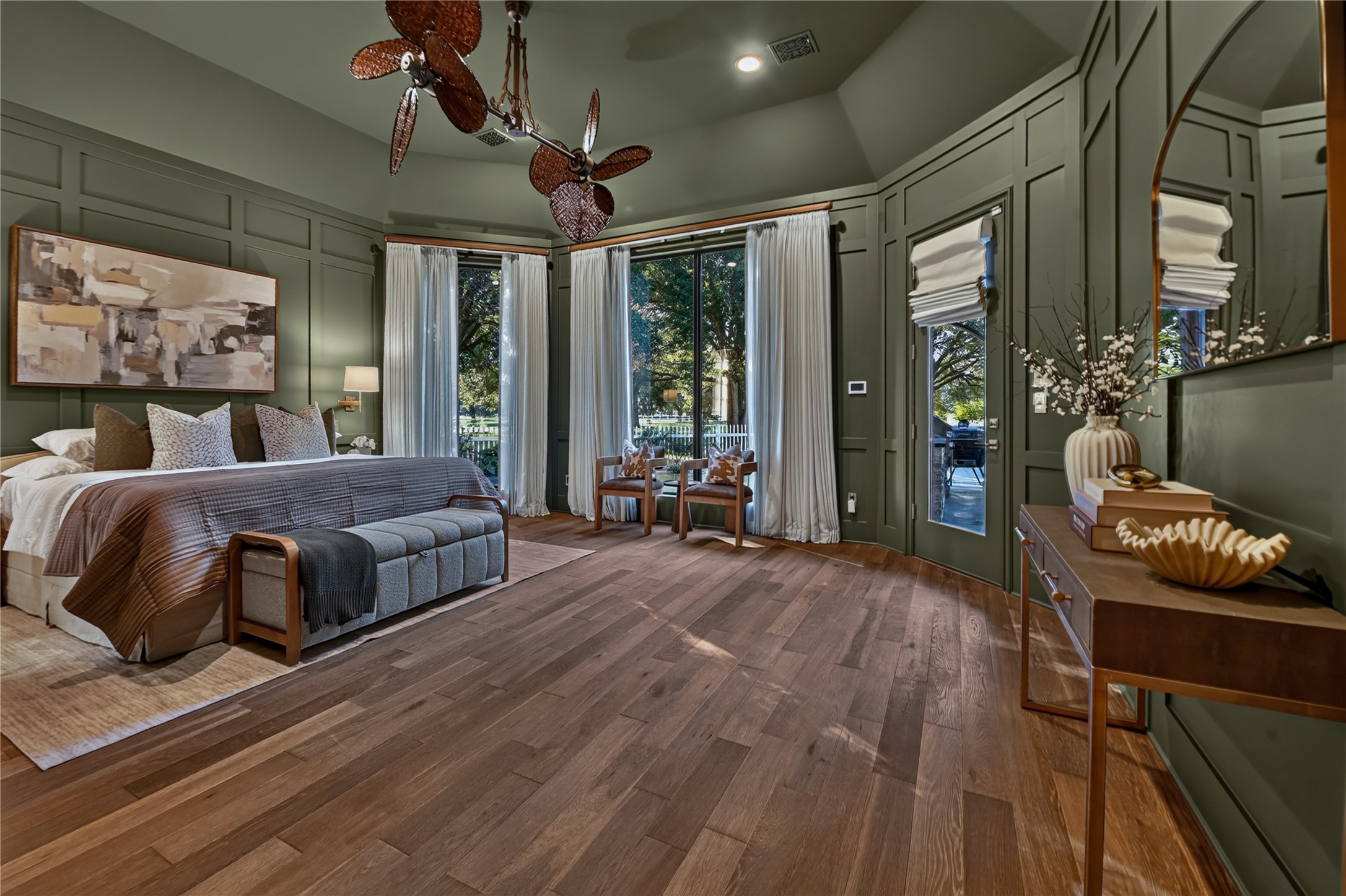 The primary suite was updated in 2025 with high-end designer finishes throughout.