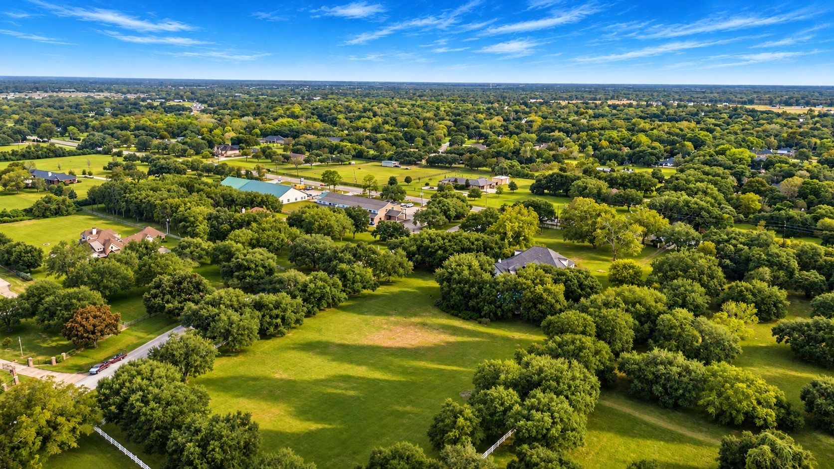 Unlimited opportunities exist for this expanded green space located behind the home. +3 Acres to the right (Hwy 359 frontage) also available - price upon request.