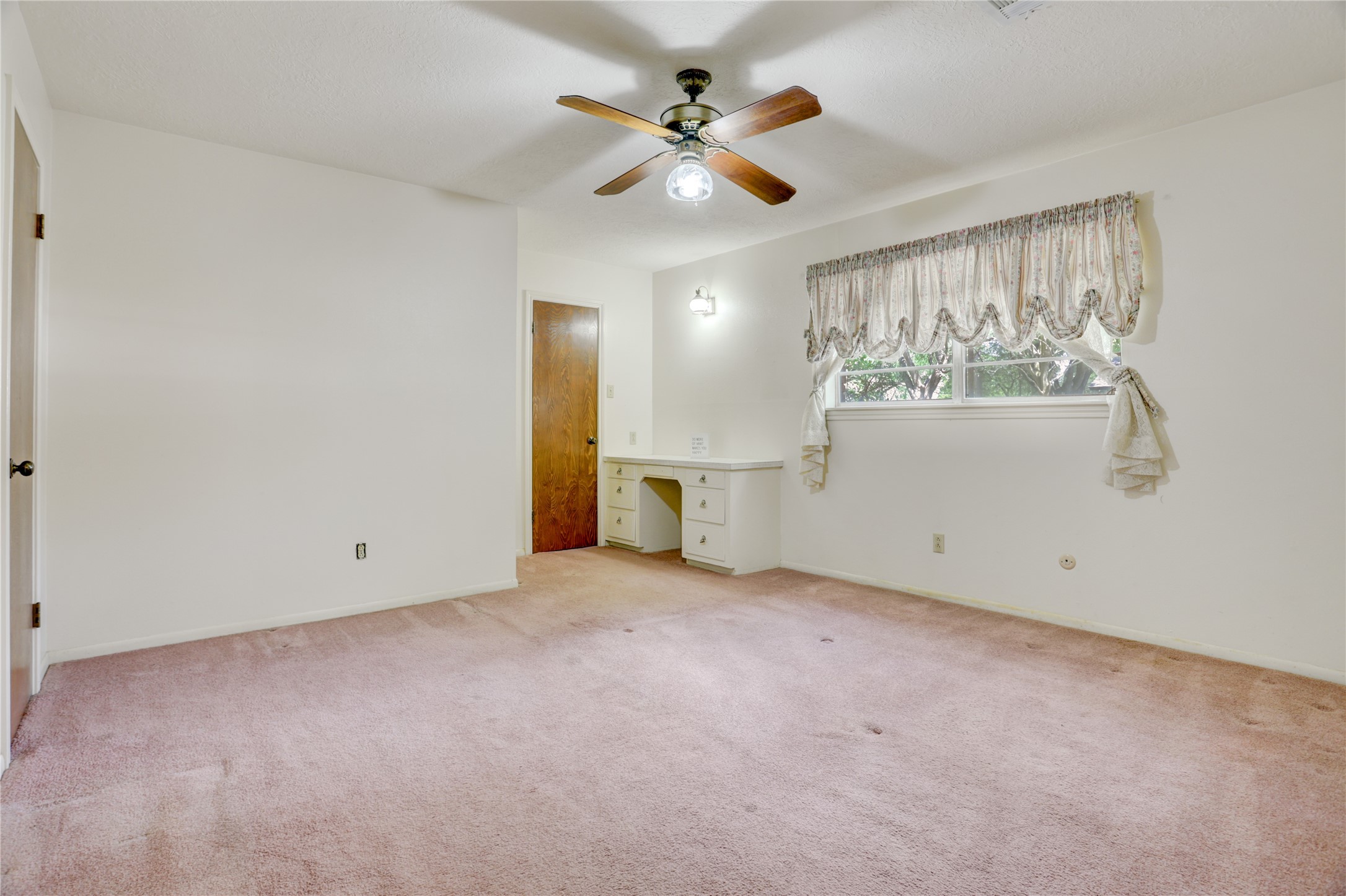 Primary downstairs bedroom with 2 walk in closets