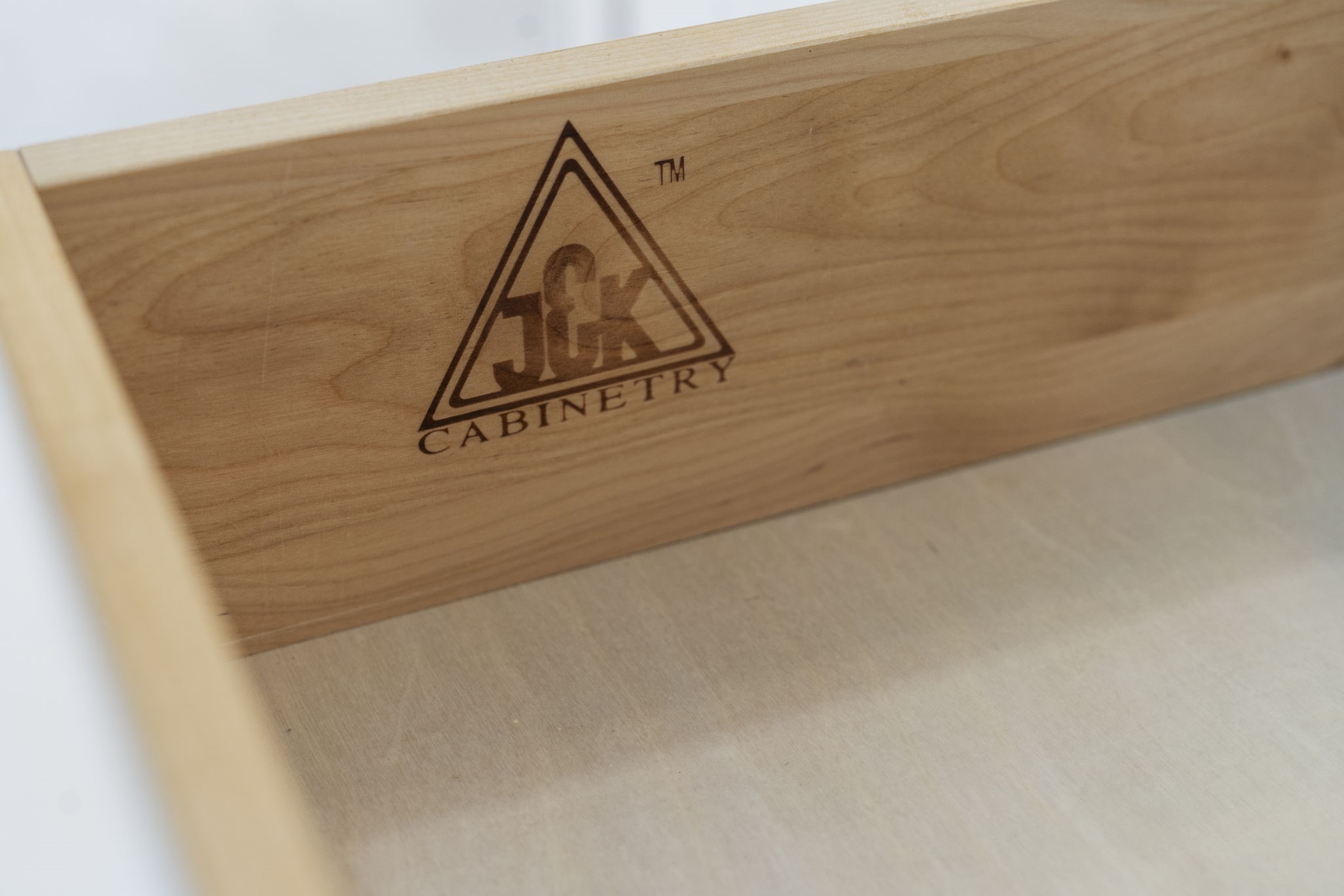 Quality craftsmanship is found throughout, including JCK Cabinetry with solid wood drawer constructiona detail that speaks to the kitchens thoughtful design.