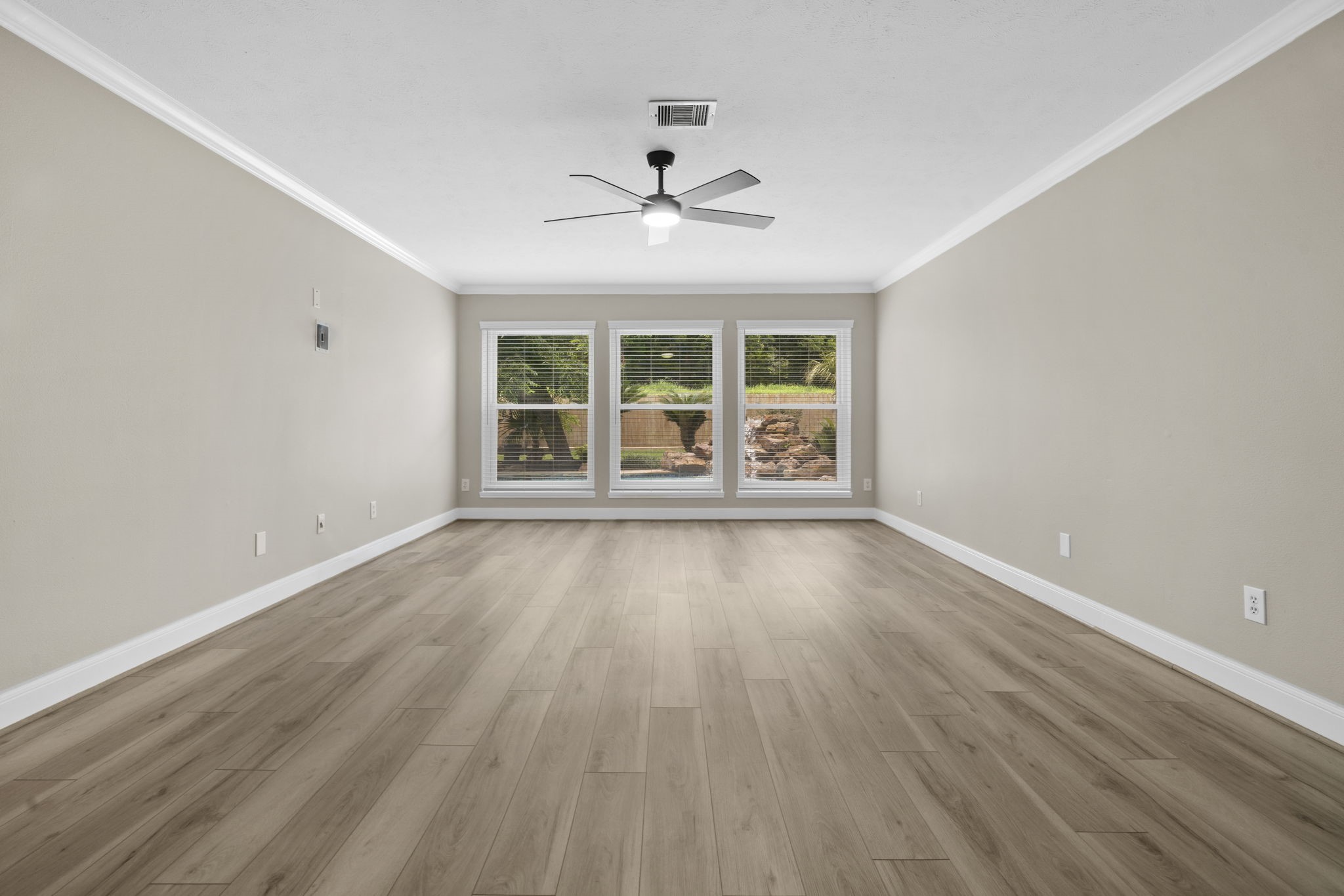 The spacious primary suite offers a peaceful retreat with fresh designer paint, updated flooring & views overlooking the backyard and pool. The spacious primary suite offers a peaceful retreat with fresh designer paint, updated flooring & views overlooking the backyard and pool.