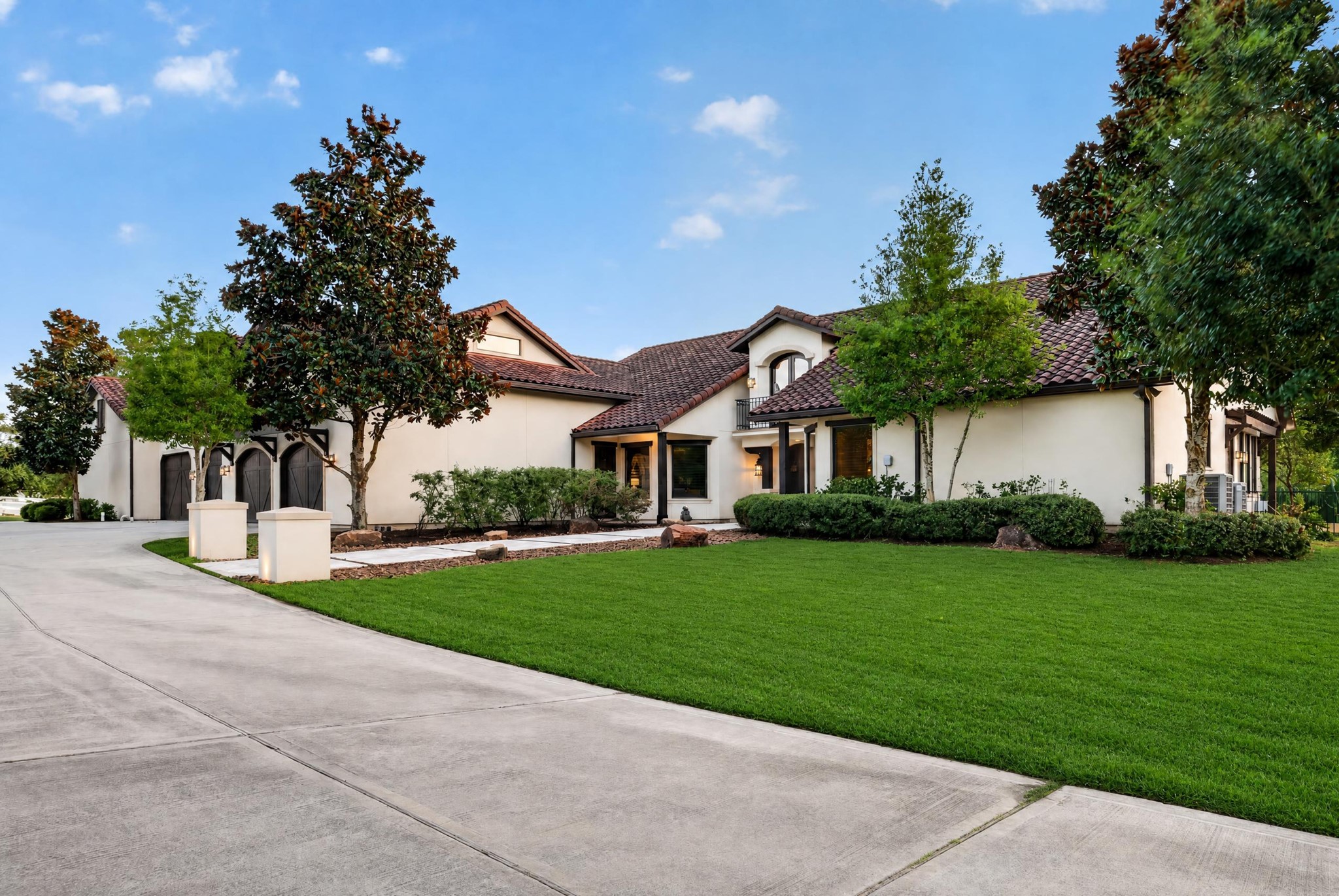 Timeless architecture, manicured lawns and mature trees give the daylight approach enduring elegance.