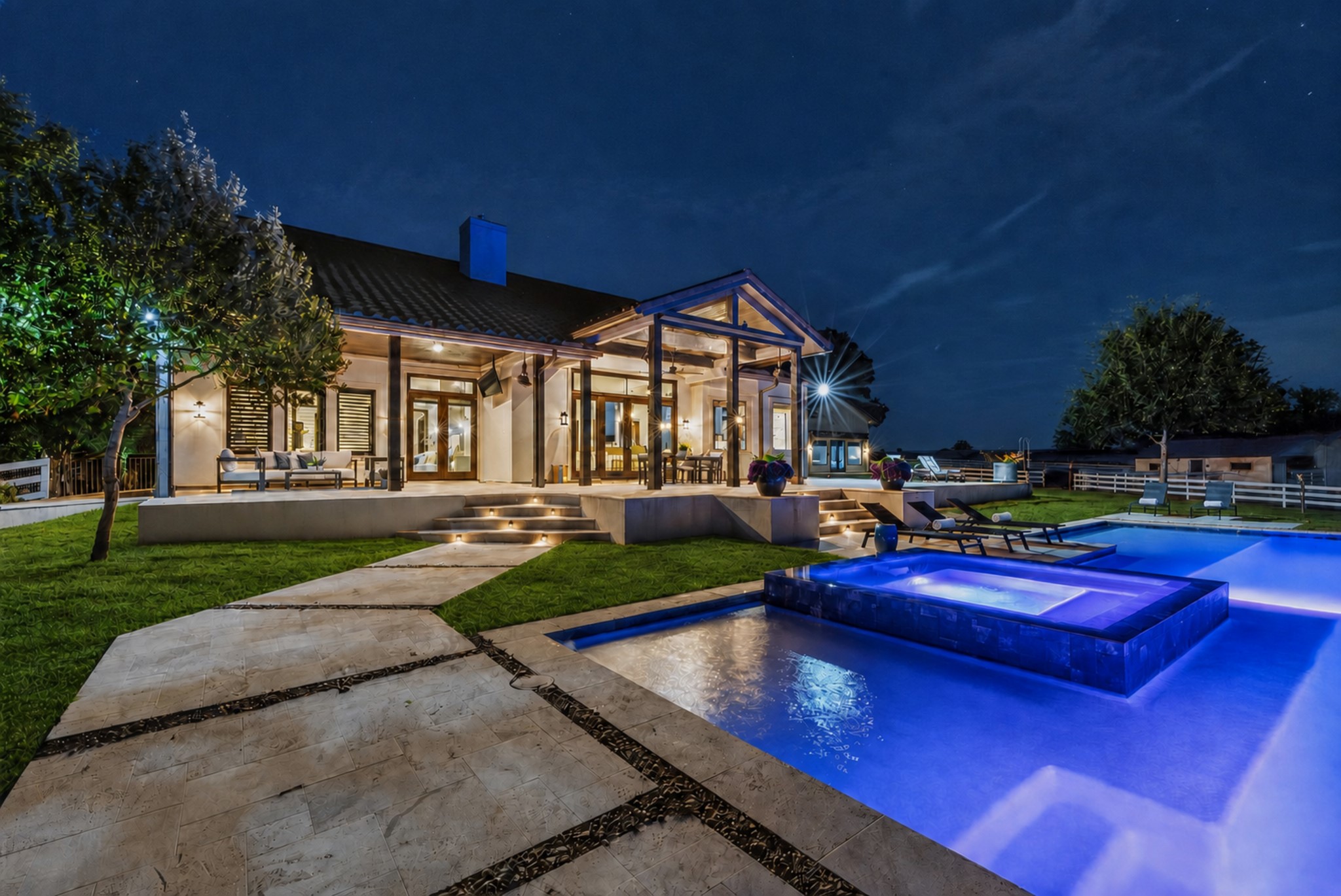 Covered poolside living invites cocktails, conversation and laughter long after the sun disappears.