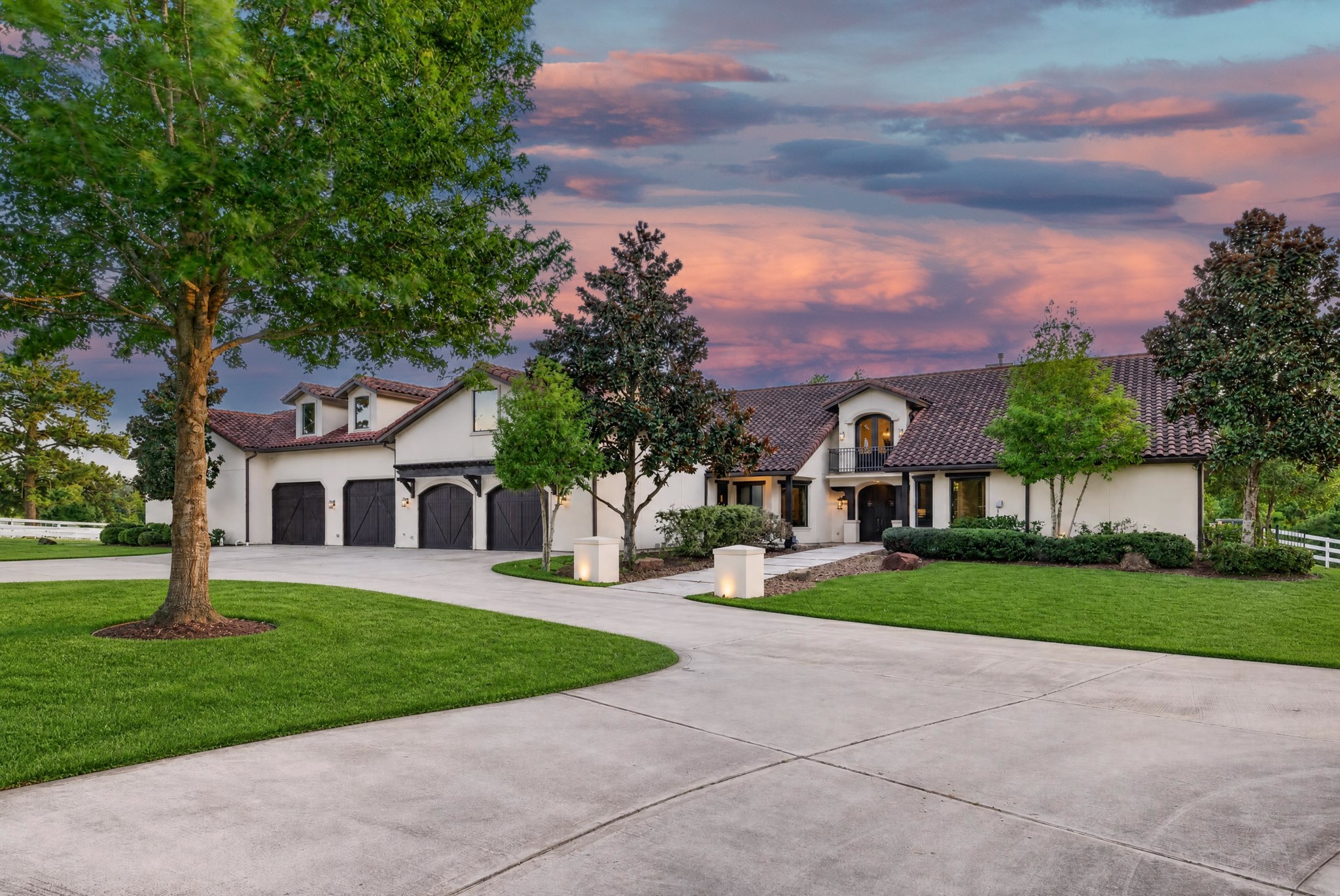 A grand twilight arrival introduces a custom residence designed to make leaving feel unnecessary.