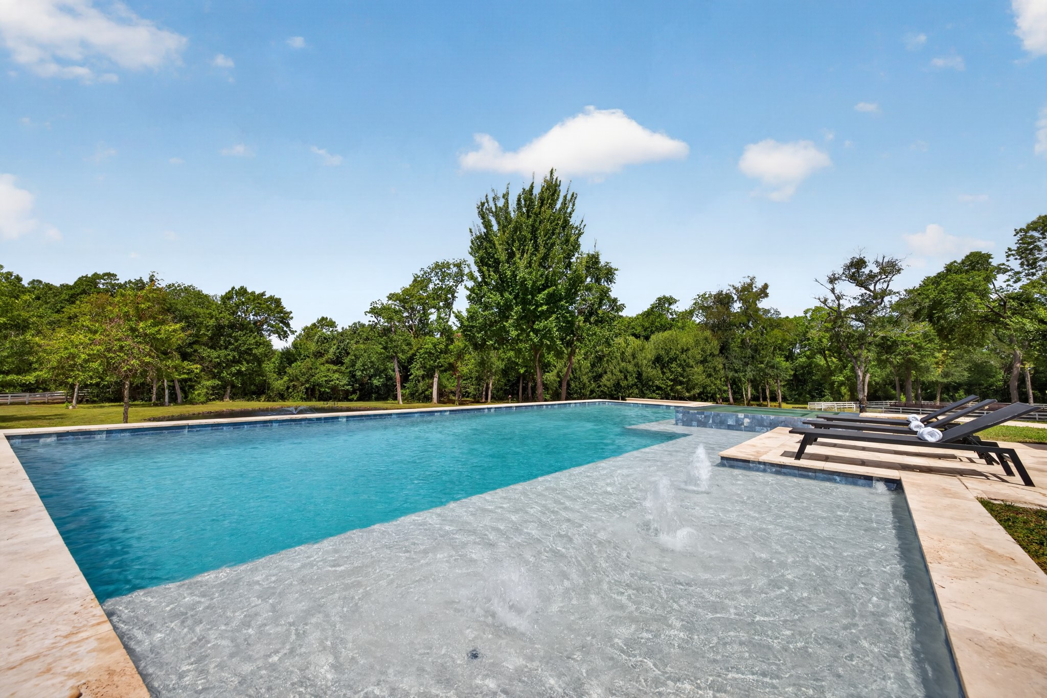 The 40-foot lap pool was made for morning swims, family play and sun-filled afternoons.