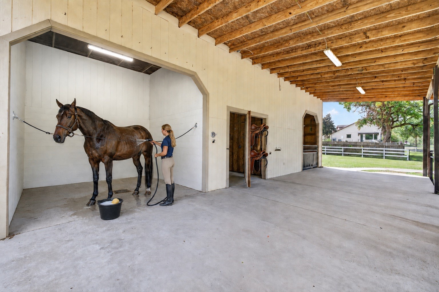 The covered stable area keeps horses close, comfortable and part of everyday family life.