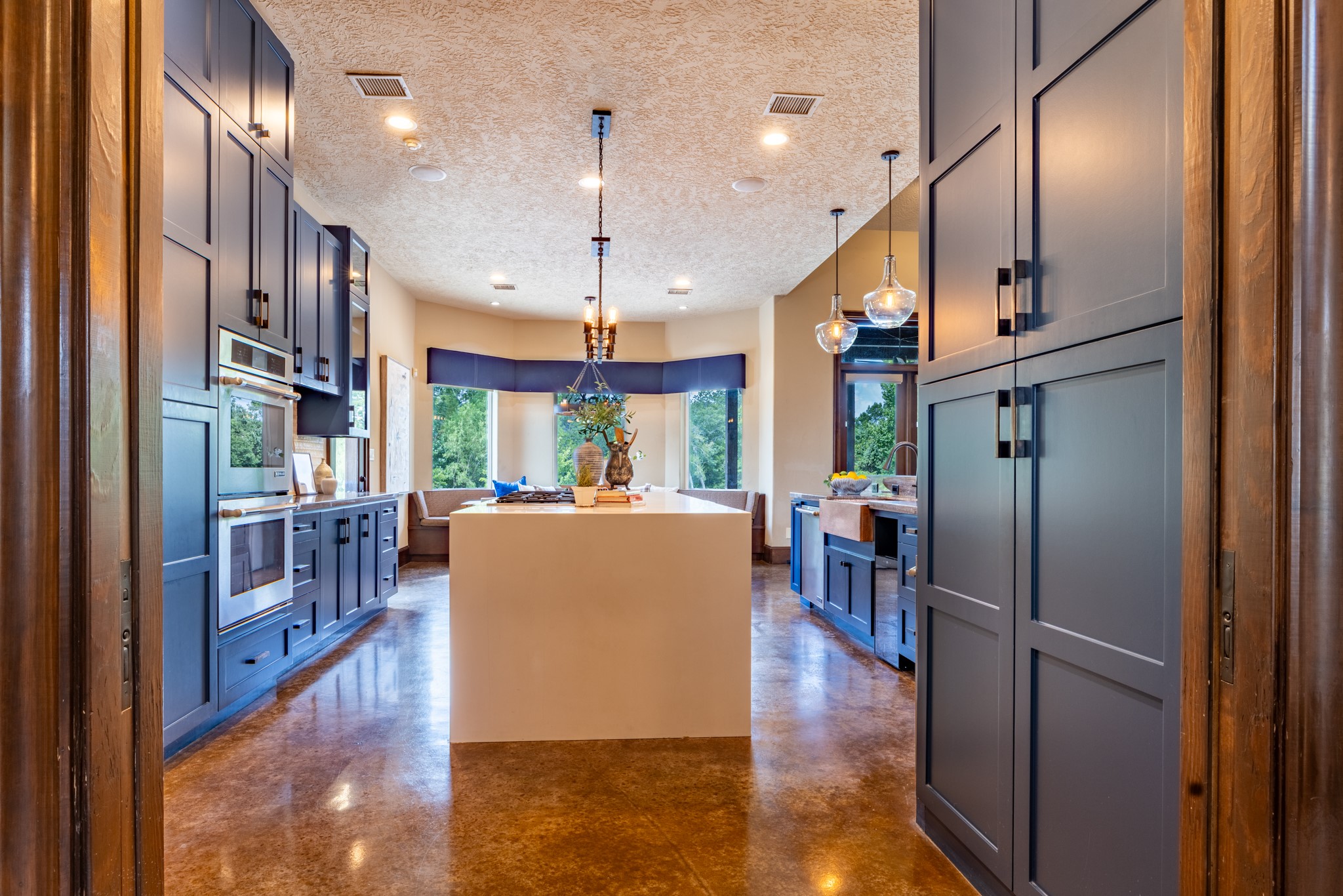 Professional appliances and generous workspaces make hosting holidays and large family gatherings feel effortless.