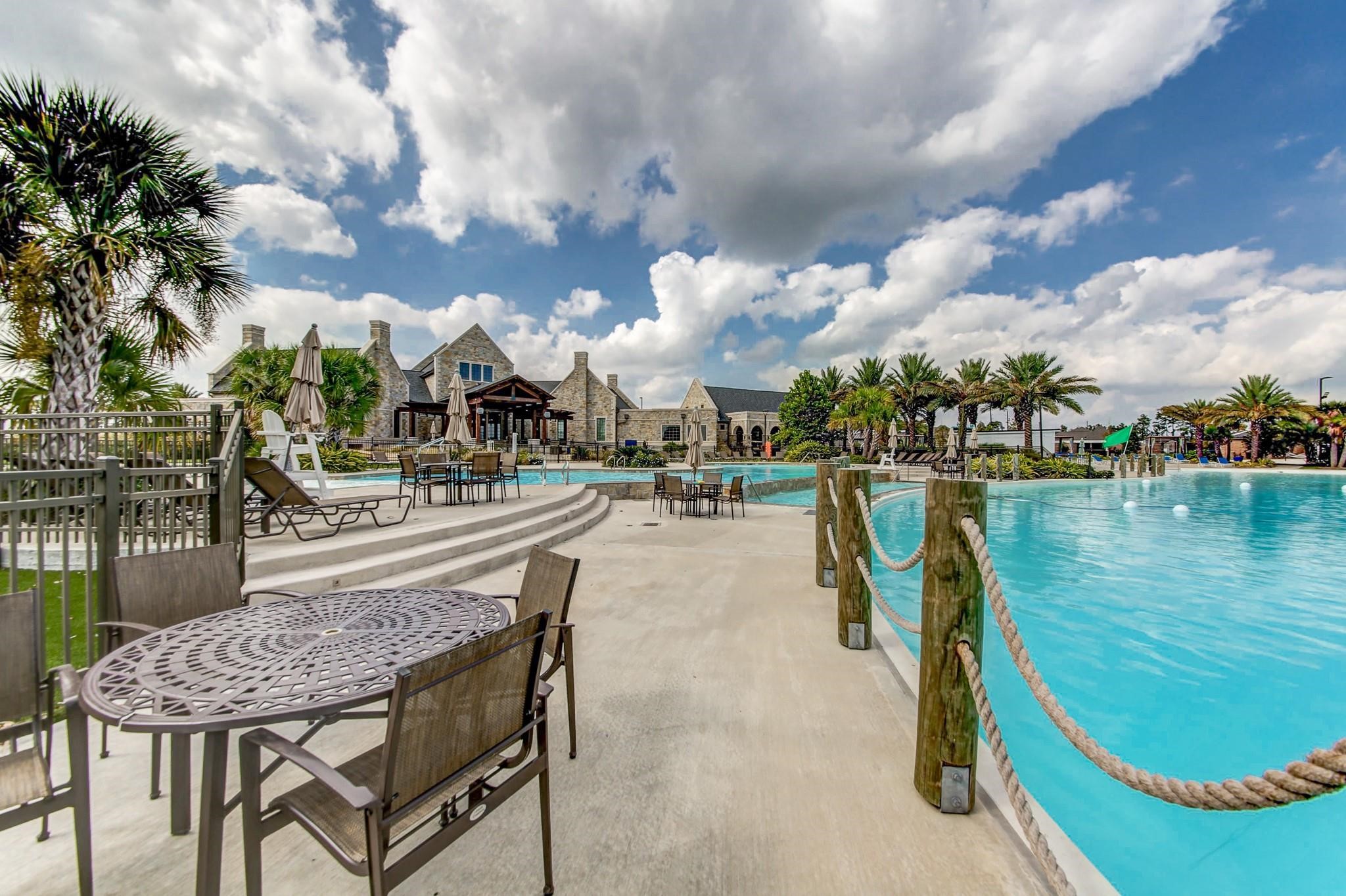 Infinity-edge pool , separates resort-style pool, and splash pads adjacent to the lagoon.
