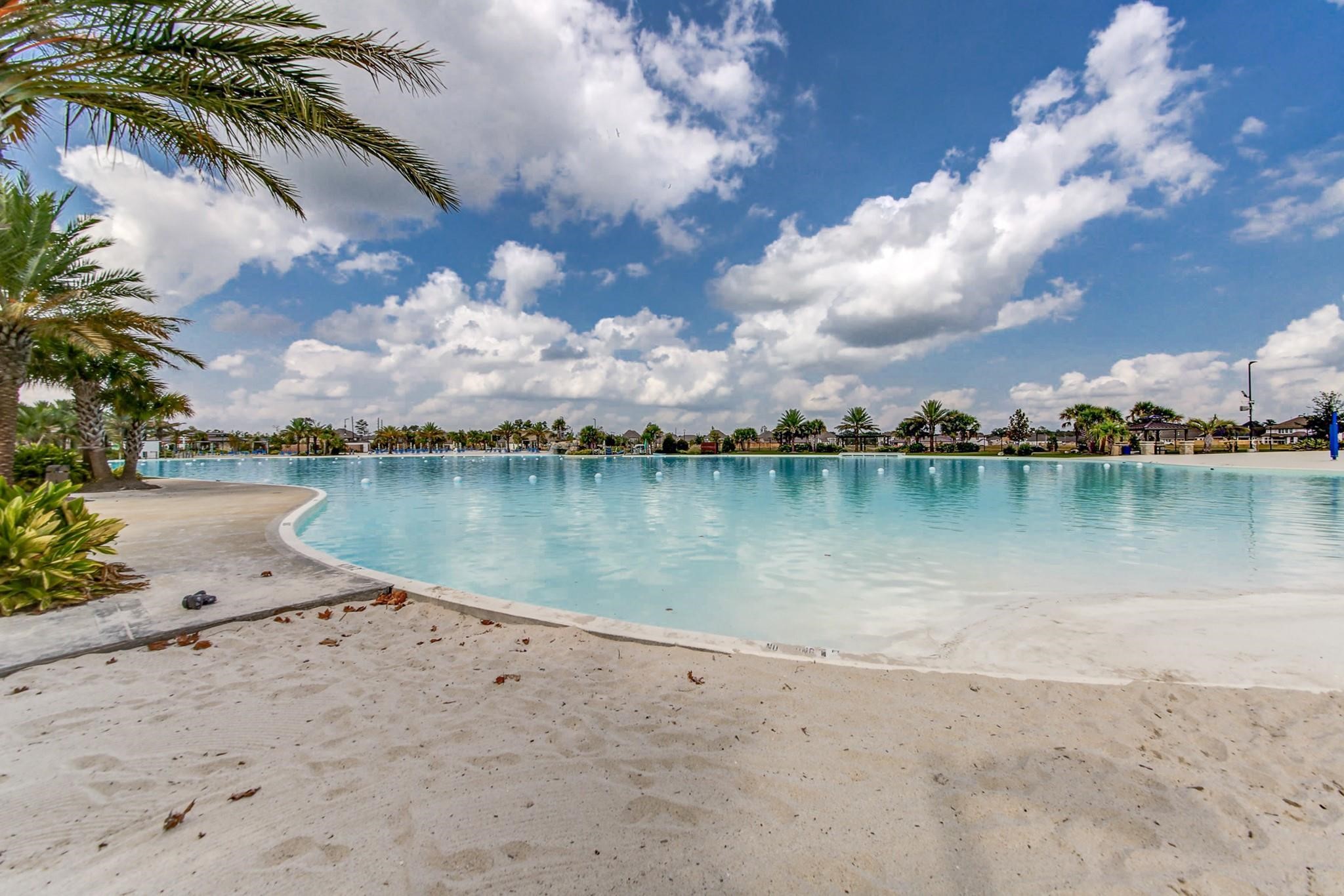 Neighborhood amenities include 2-acre Crystal Clear Lagoon with white-sand beaches, divided into areas such as Family BEach, Serenity Beach, and Kid's Cove for little ones.