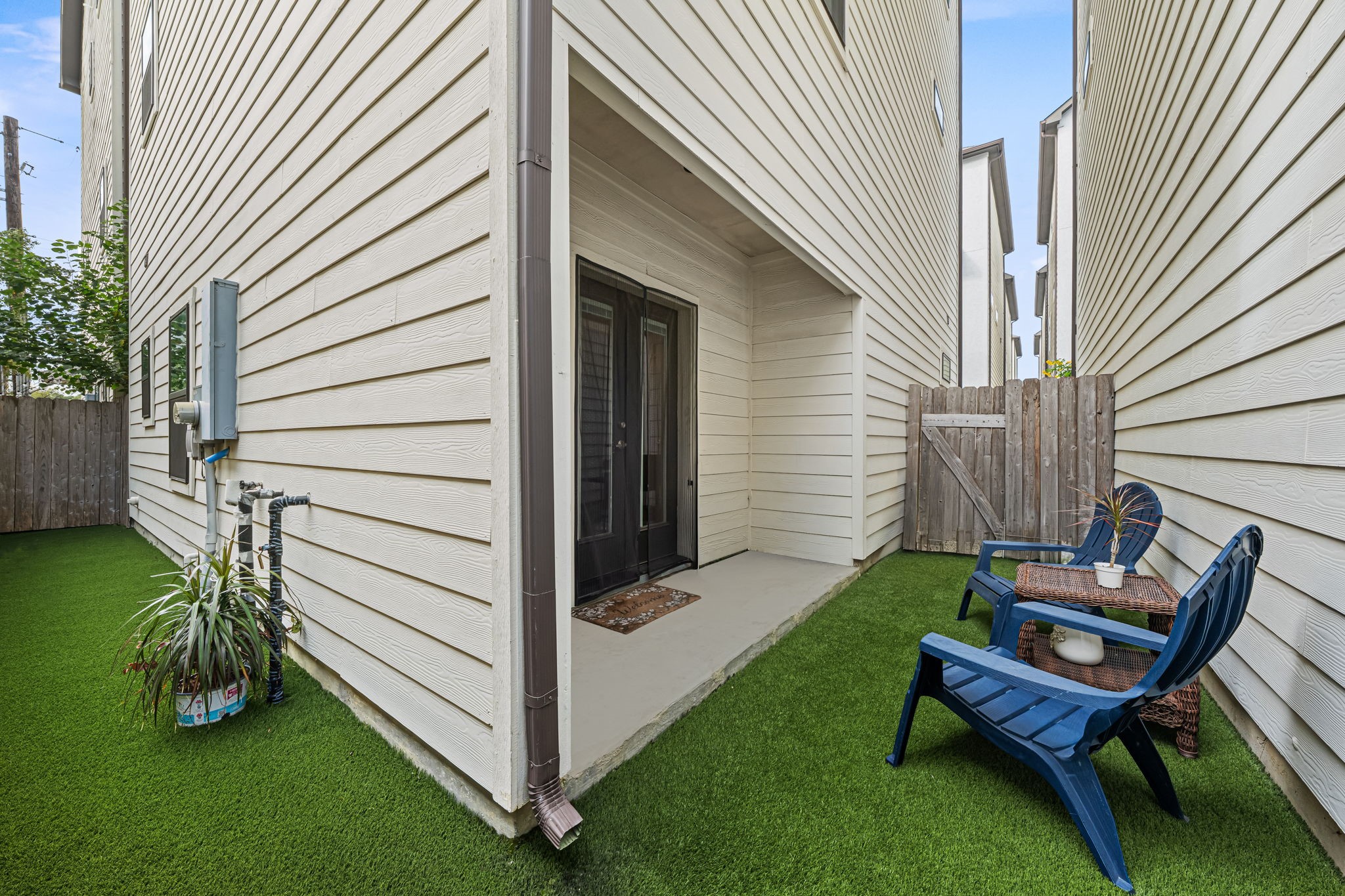 Low-maintenance turf turns this fenced backyard into an inviting outdoor escape. The space is ready for unhurried mornings and a little fresh air at day's end. Low-maintenance turf turns this fenced backyard into an inviting outdoor escape. The space is ready for unhurried mornings and a little fresh air at day's end.